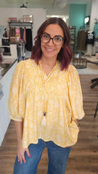 Shop Floral Print Peasant Top with Puff Sleeves and Tie Neck- at Ruby Joy Boutique, a Women's Clothing Store in Pickerington, Ohio