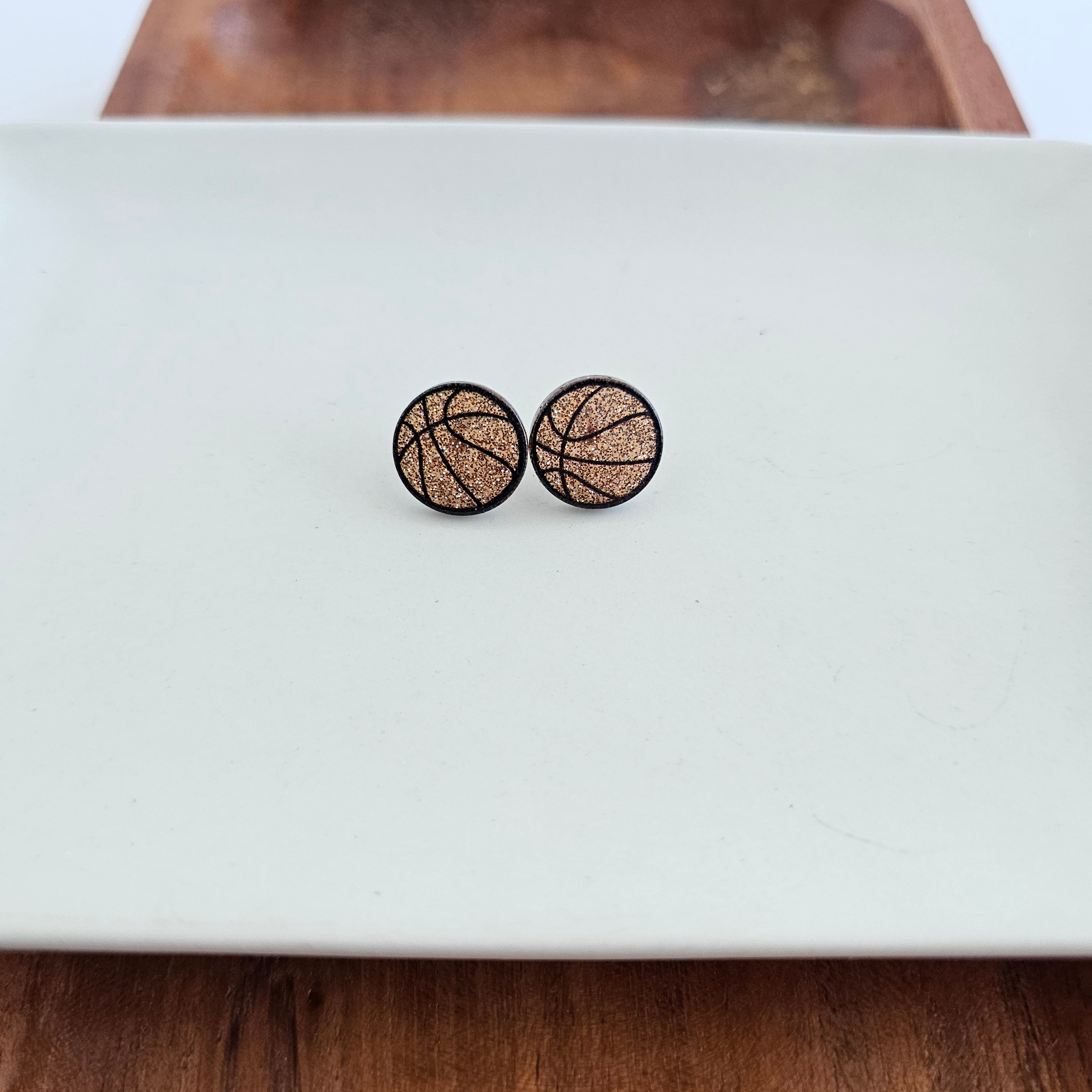 Shop Glitter Basketball Studs- at Ruby Joy Boutique, a Women's Clothing Store in Pickerington, Ohio