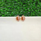 Shop Glitter Football Studs- at Ruby Joy Boutique, a Women's Clothing Store in Pickerington, Ohio