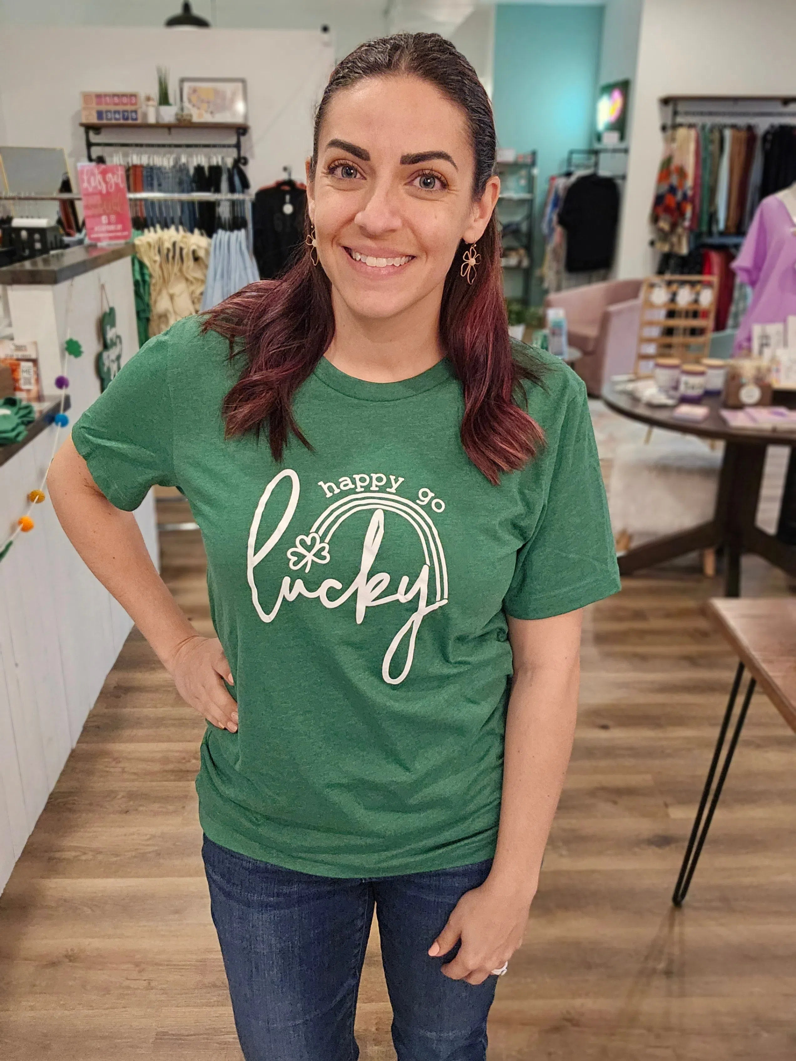 Shop Happy Go Lucky Rainbow St Patrick's Day Graphic Tee-Graphic Tee at Ruby Joy Boutique, a Women's Clothing Store in Pickerington, Ohio