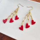 Shop Heartstring Earrings - Red- at Ruby Joy Boutique, a Women's Clothing Store in Pickerington, Ohio
