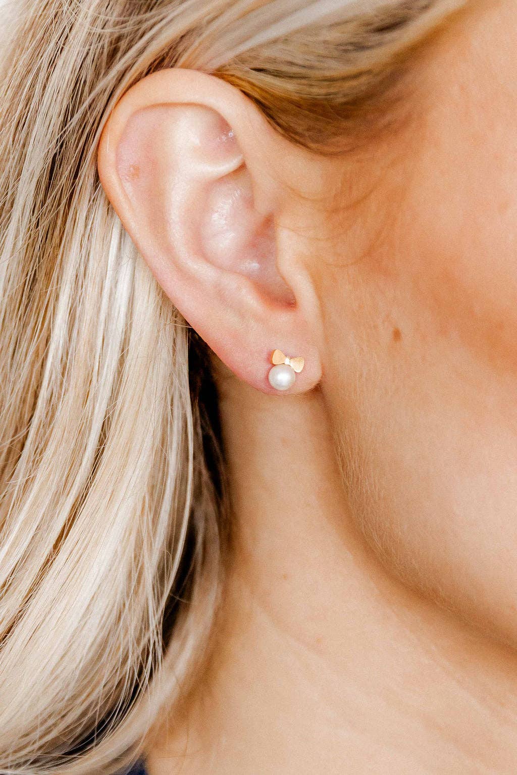 Shop Heidi Pearl Bow Screwback Stud Earrings- at Ruby Joy Boutique, a Women's Clothing Store in Pickerington, Ohio