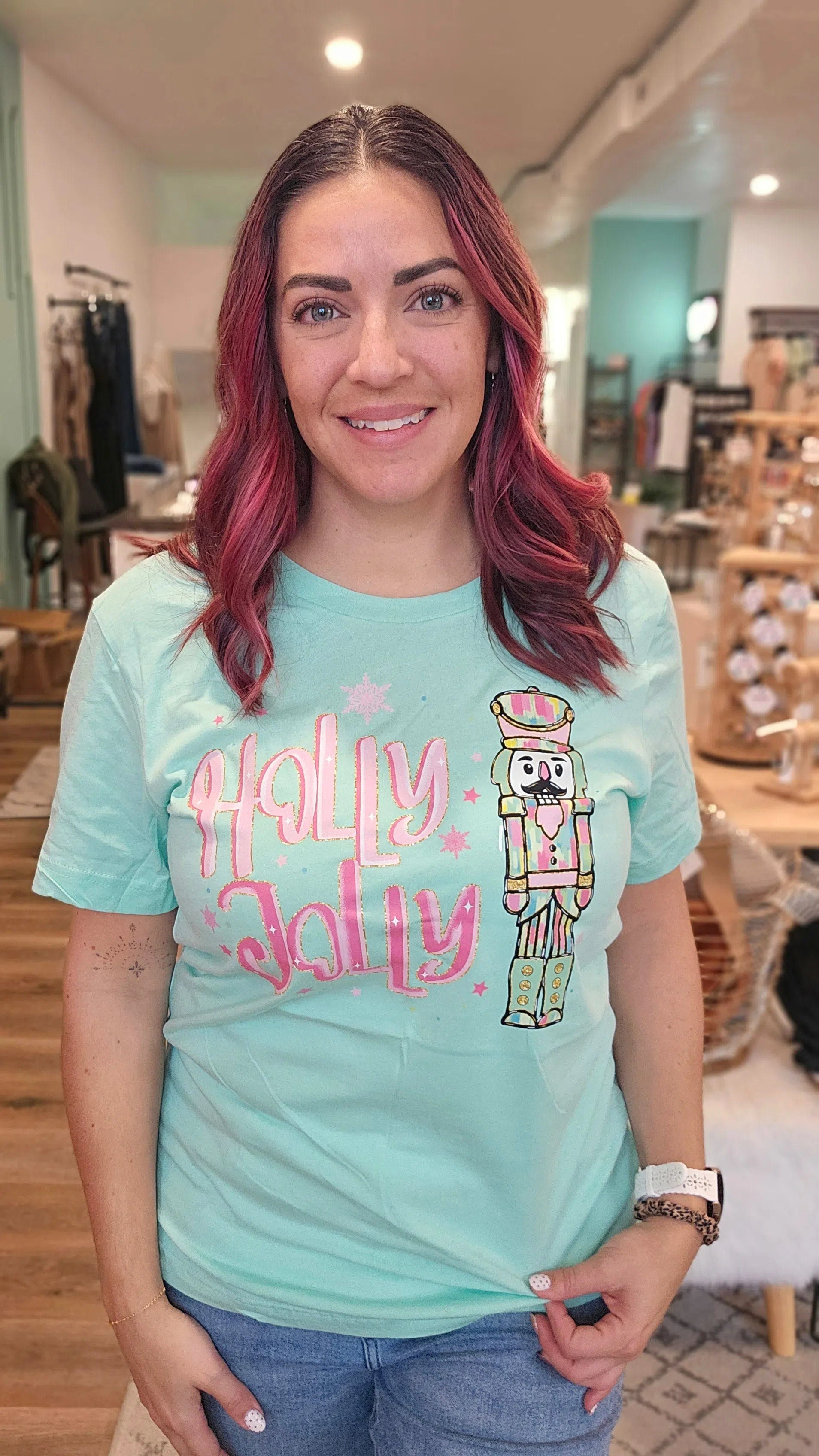 Shop Holly Jolly Bright Nutcracker Tee-Graphic Tee at Ruby Joy Boutique, a Women's Clothing Store in Pickerington, Ohio