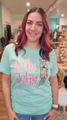 Shop Holly Jolly Bright Nutcracker Tee-Graphic Tee at Ruby Joy Boutique, a Women's Clothing Store in Pickerington, Ohio