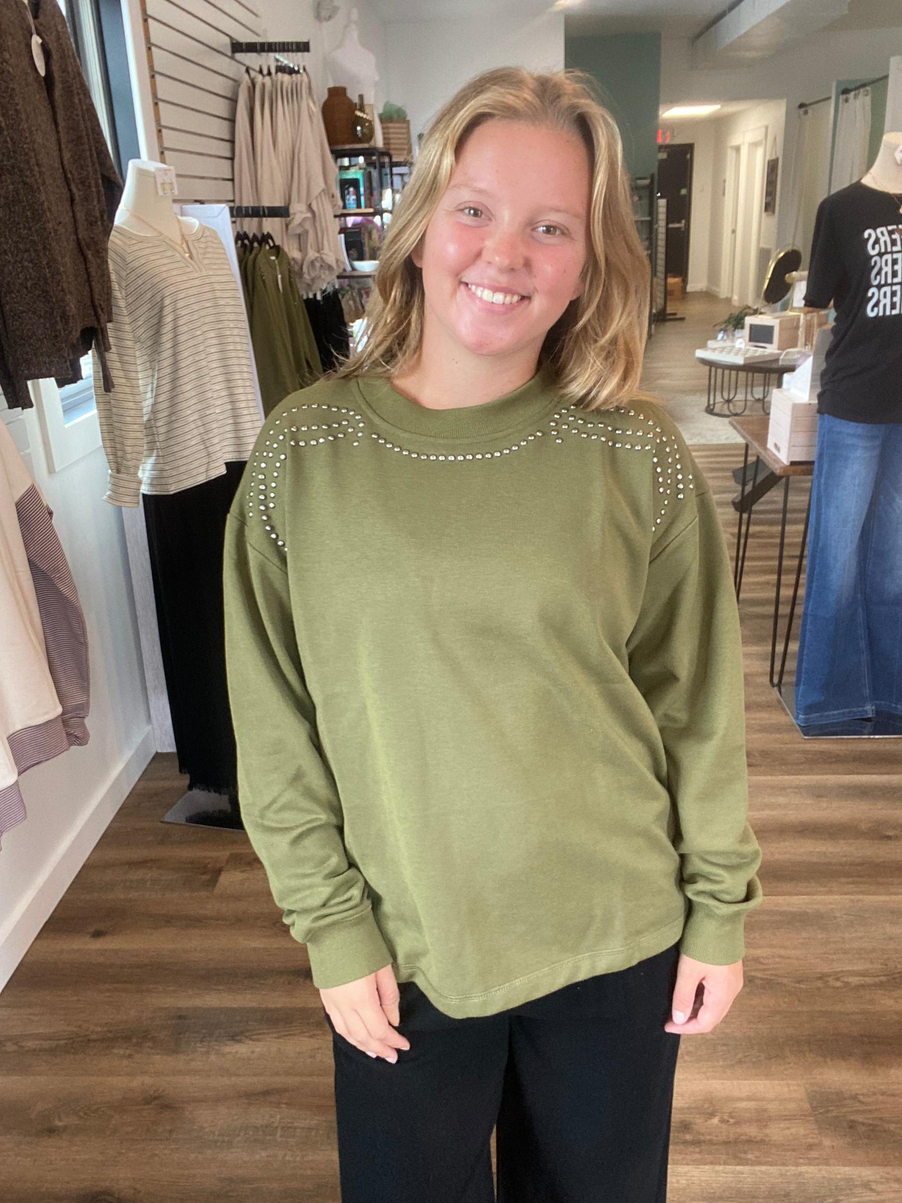 Shop Stud Shoulder Sweatshirt: Olive- at Ruby Joy Boutique, a Women's Clothing Store in Pickerington, Ohio