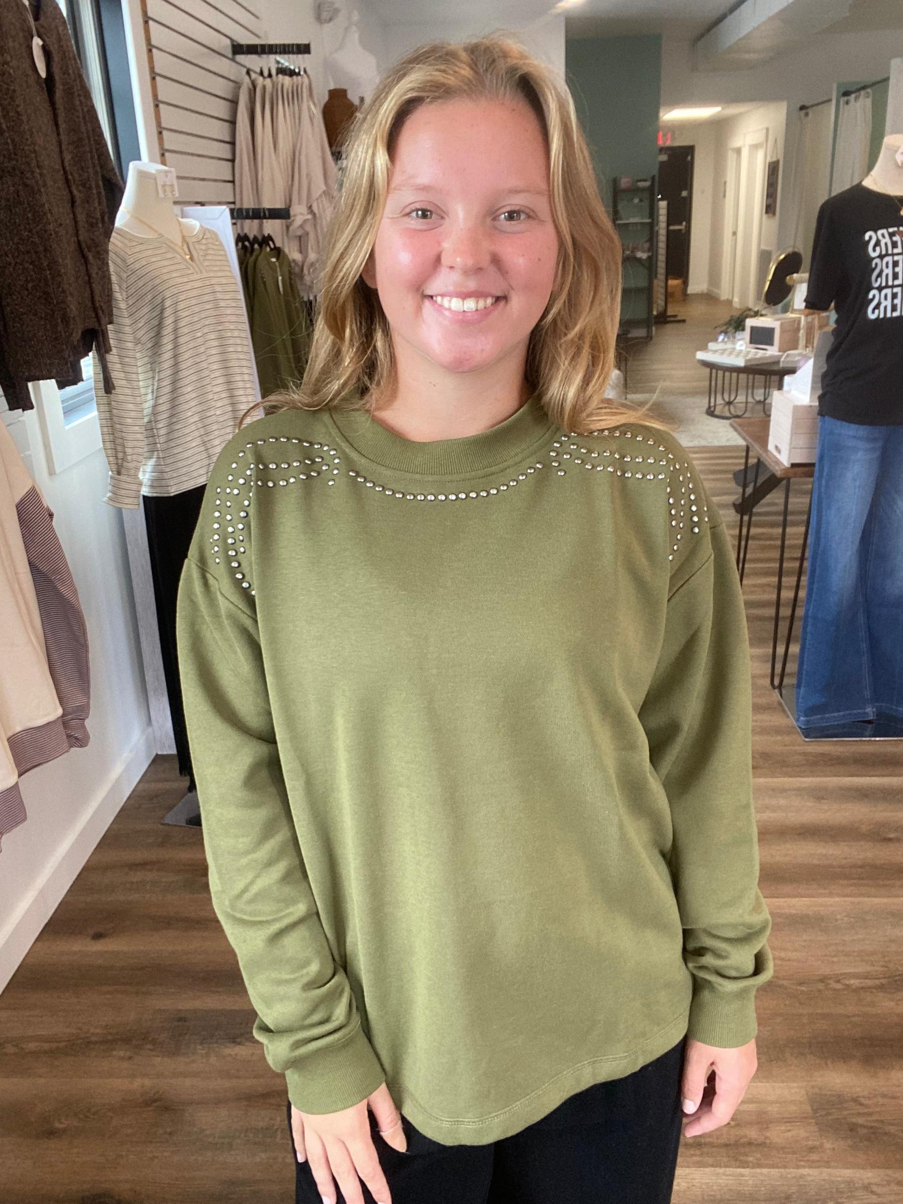 Shop Stud Shoulder Sweatshirt: Olive- at Ruby Joy Boutique, a Women's Clothing Store in Pickerington, Ohio
