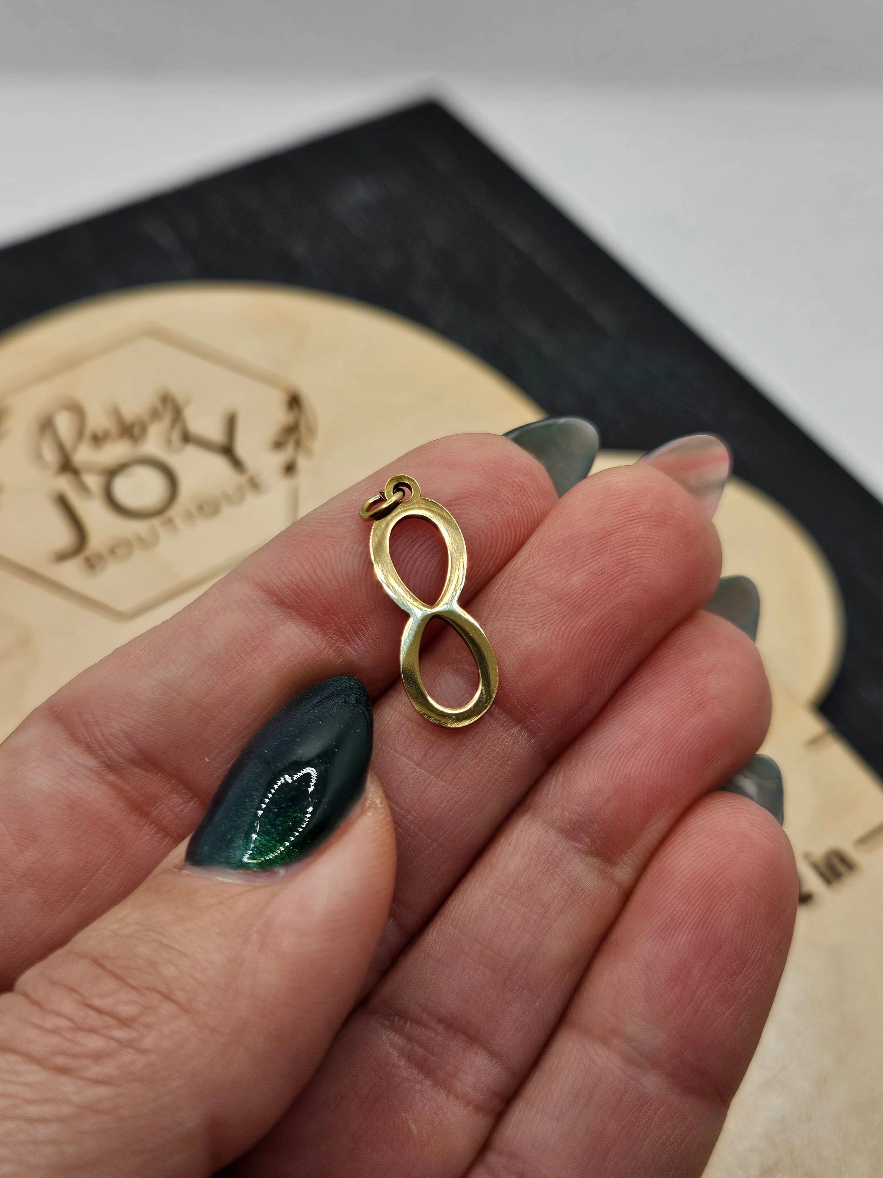 Shop Infinity Charm- at Ruby Joy Boutique, a Women's Clothing Store in Pickerington, Ohio