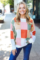 Shop Ivory & Rust Checkered Sweater- at Ruby Joy Boutique, a Women's Clothing Store in Pickerington, Ohio