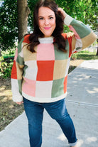 Shop Ivory & Rust Checkered Sweater- at Ruby Joy Boutique, a Women's Clothing Store in Pickerington, Ohio