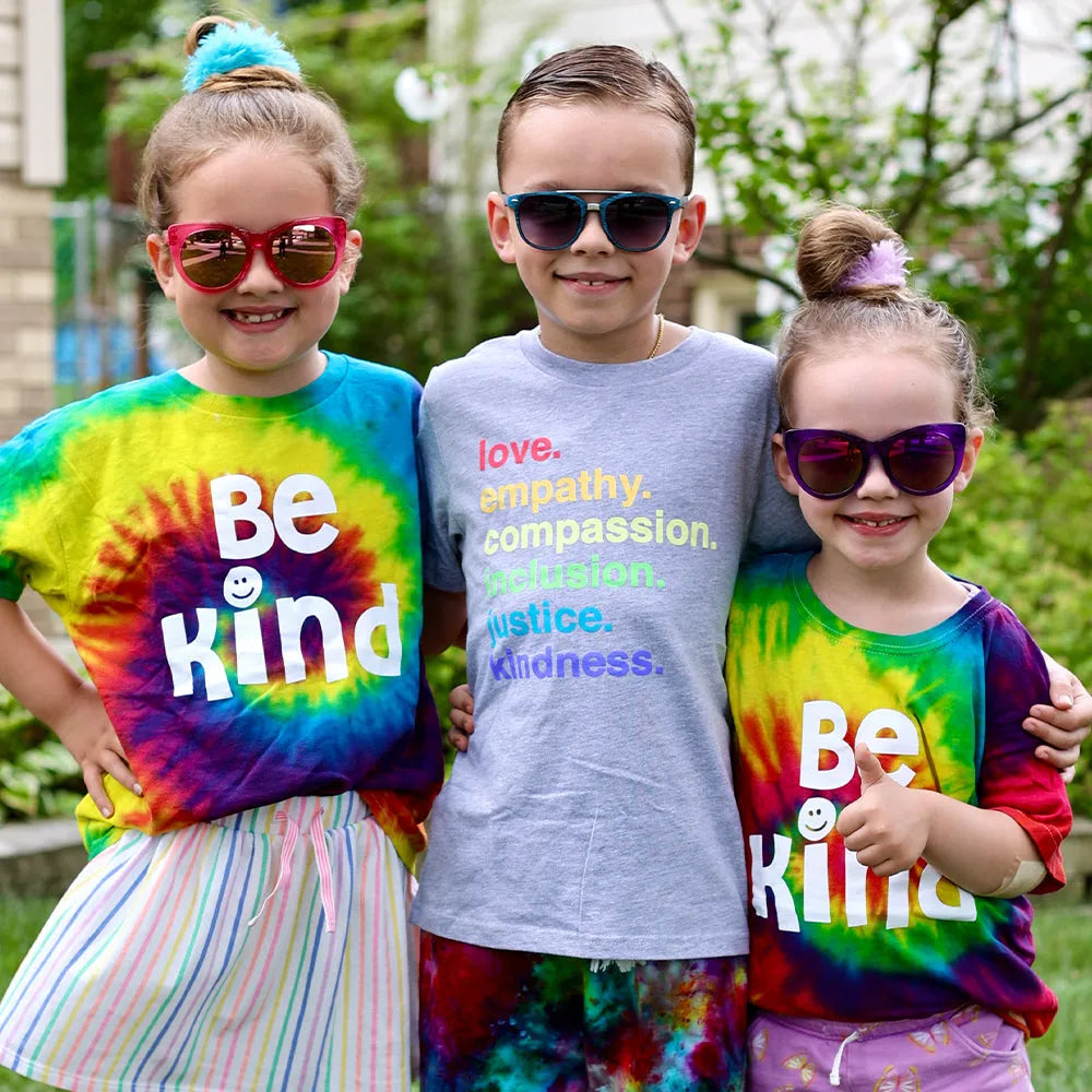 Shop 'Kindness Is' Pride Kids Tee | Kind Cotton- at Ruby Joy Boutique, a Women's Clothing Store in Pickerington, Ohio