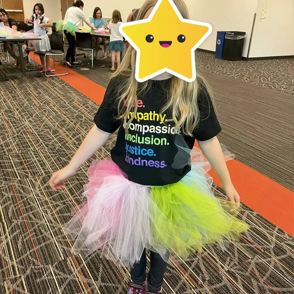 Shop 'Kindness Is' Pride Kids Tee | Kind Cotton- at Ruby Joy Boutique, a Women's Clothing Store in Pickerington, Ohio