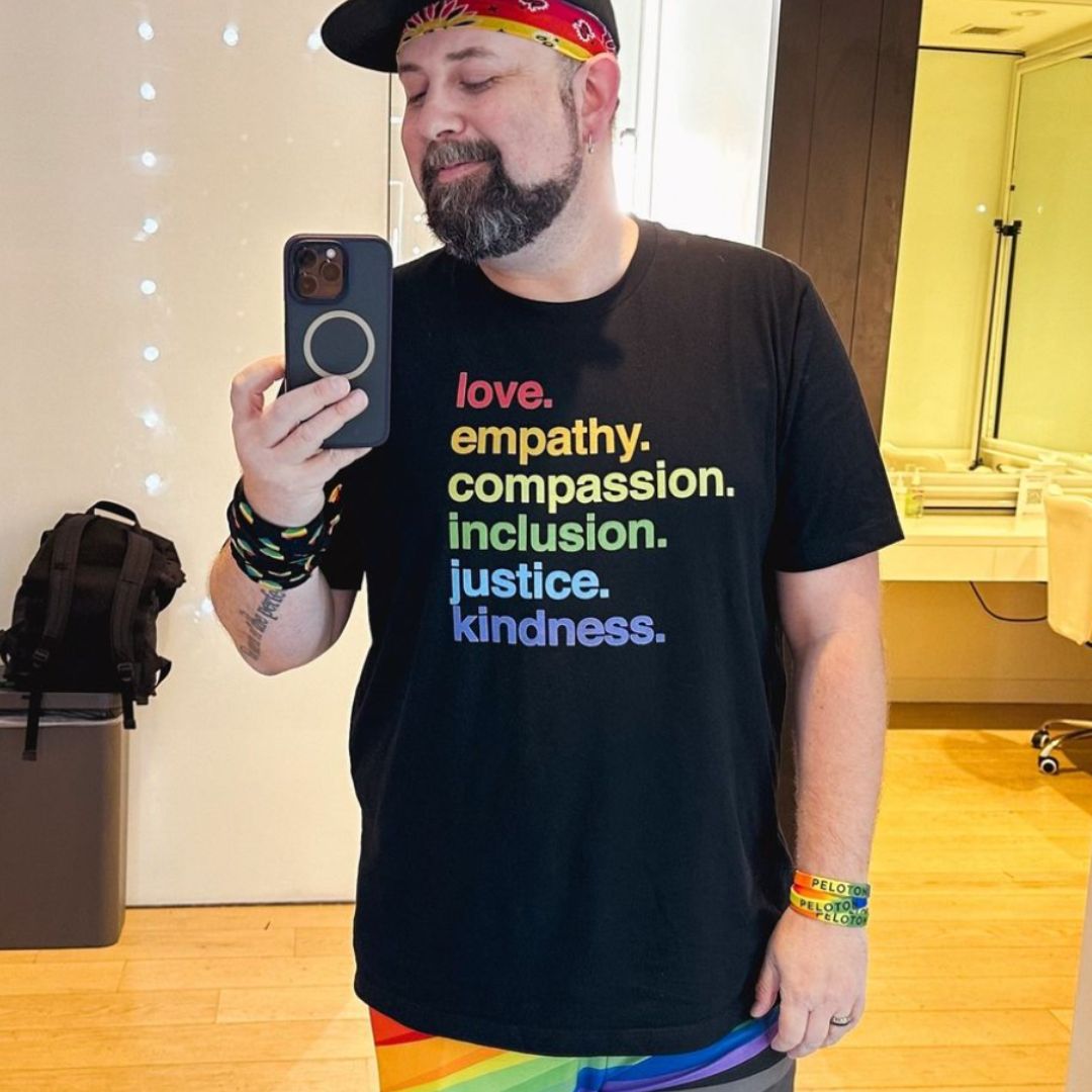 Shop 'Kindness is' Pride Classic Tee | Kind Cotton- at Ruby Joy Boutique, a Women's Clothing Store in Pickerington, Ohio