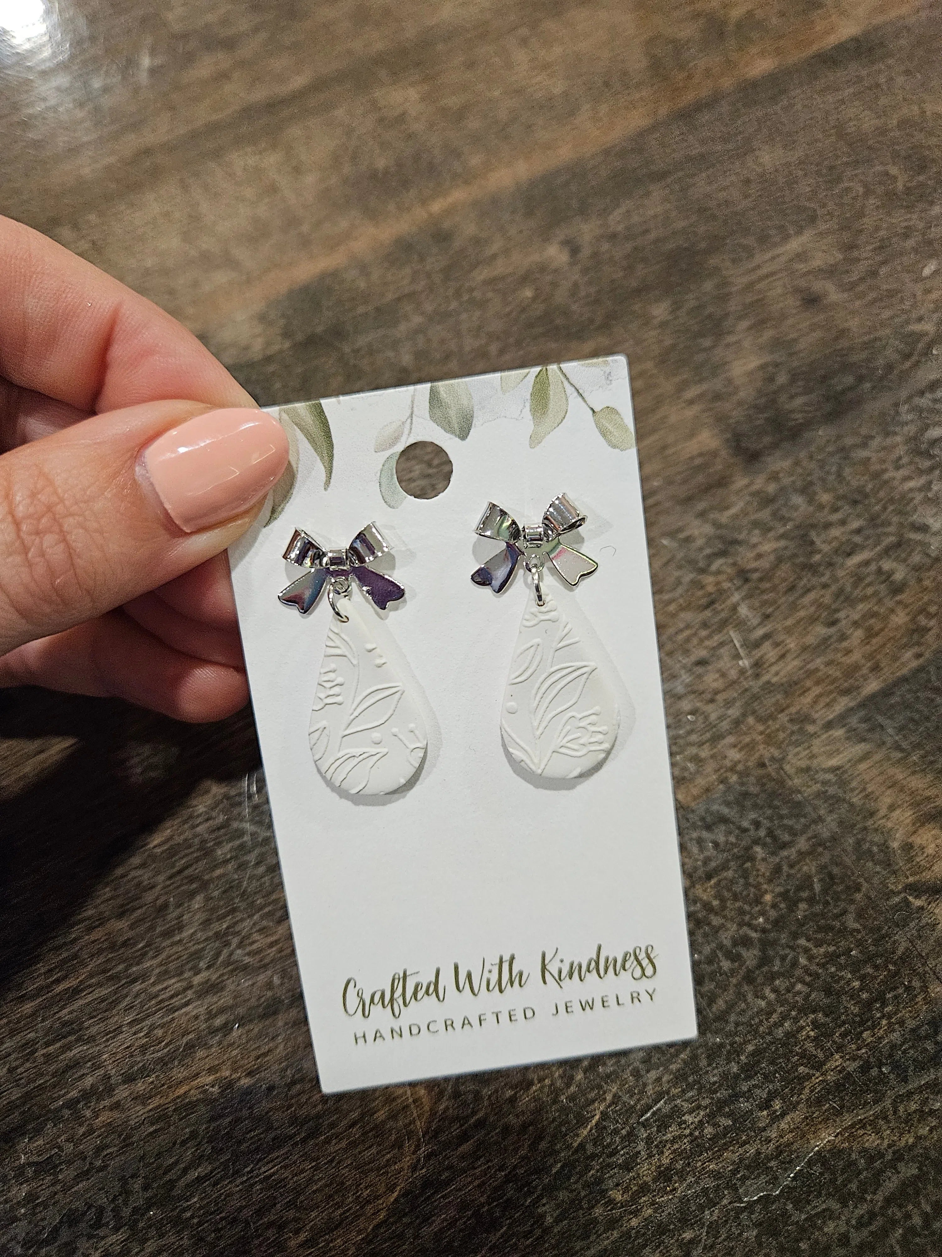 Shop Lacy Floral Teardrop Earrings with Bows-Earrings at Ruby Joy Boutique, a Women's Clothing Store in Pickerington, Ohio