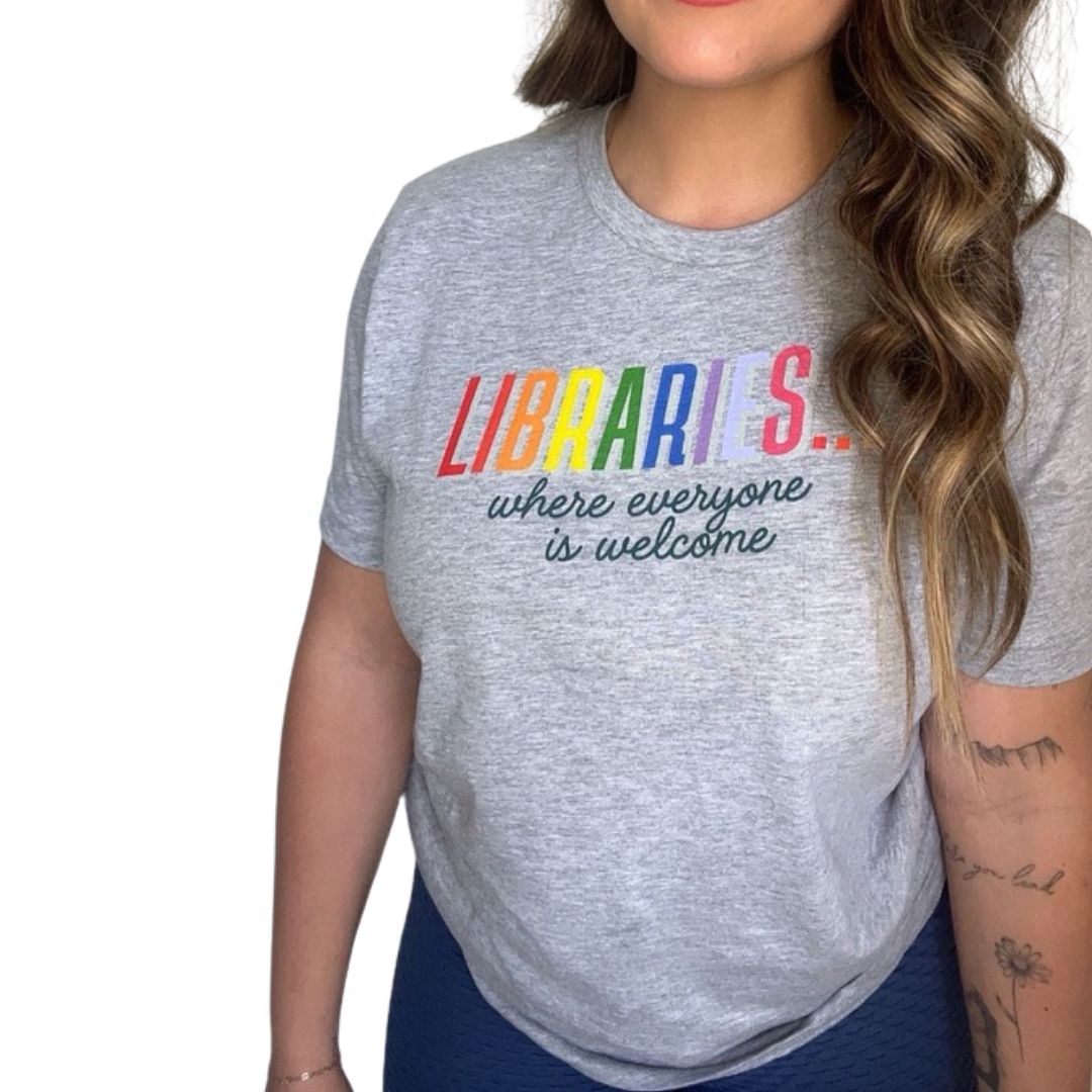 Shop Libraries Where Everyone is Welcome Classic Tee | Kind Cotton- at Ruby Joy Boutique, a Women's Clothing Store in Pickerington, Ohio
