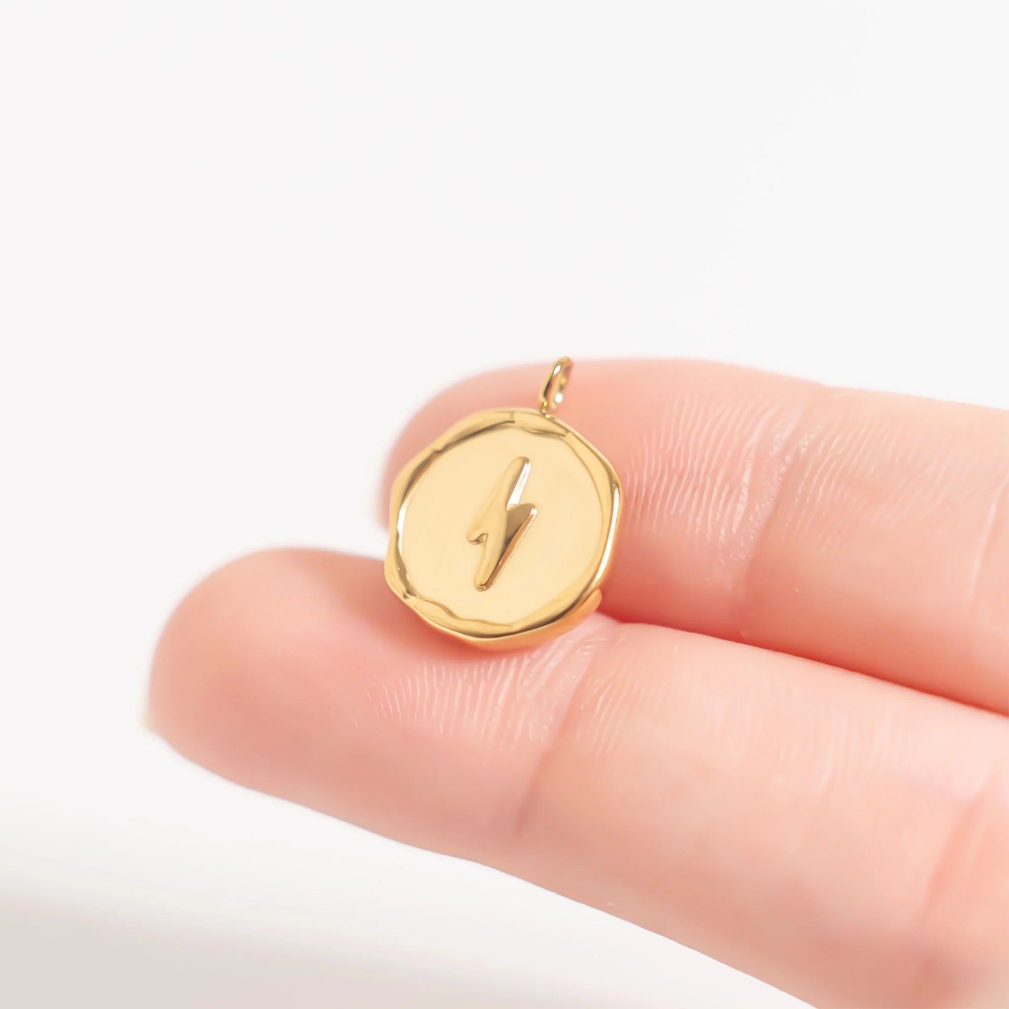 Shop Lightning Bolt Charm- at Ruby Joy Boutique, a Women's Clothing Store in Pickerington, Ohio