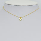 Shop Mini Gold Butterfly Charm- at Ruby Joy Boutique, a Women's Clothing Store in Pickerington, Ohio