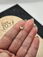 Shop Mini Gold Butterfly Charm- at Ruby Joy Boutique, a Women's Clothing Store in Pickerington, Ohio