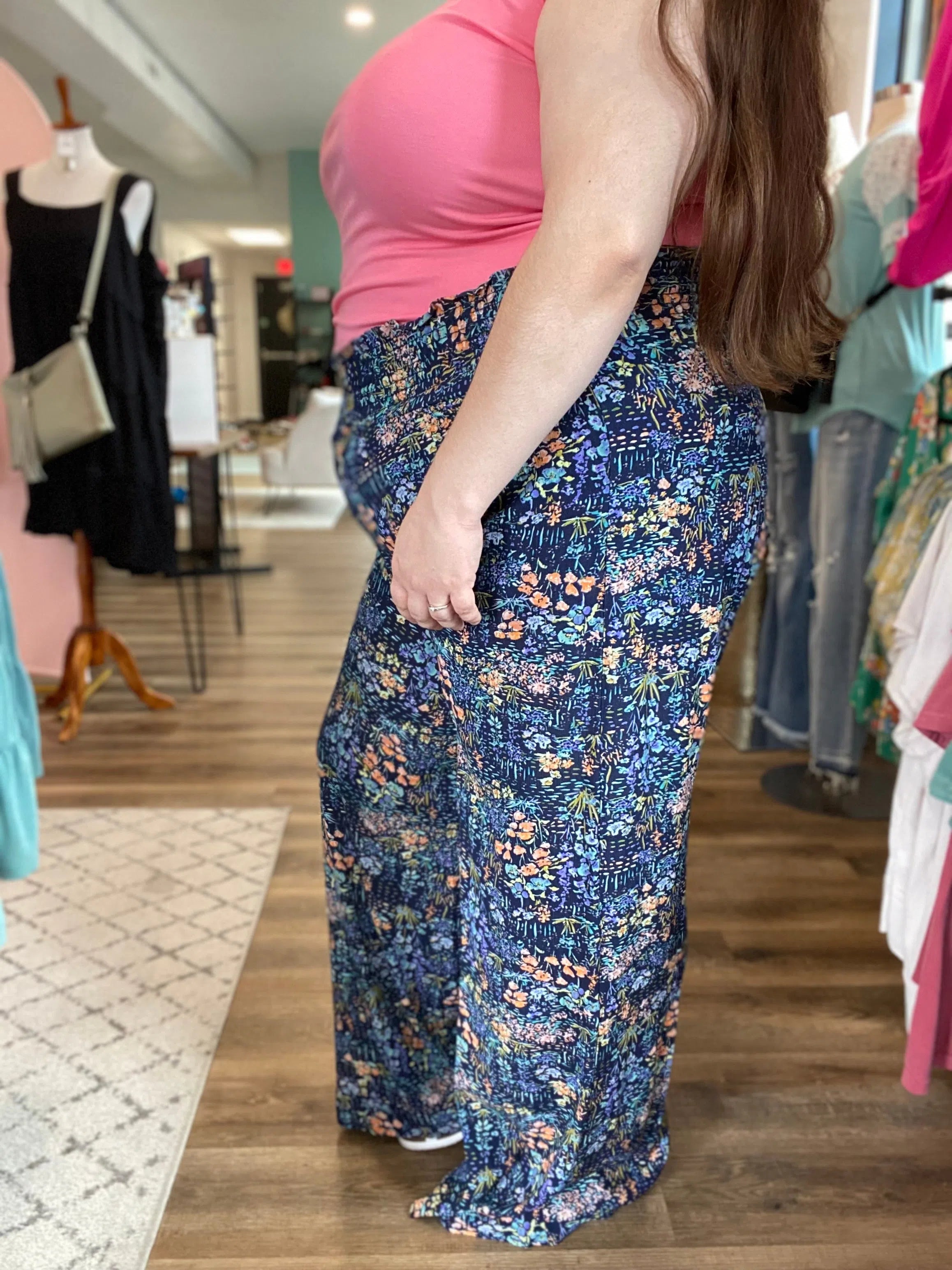 Shop Navy Floral Smocked Palazzo Pants-Pants at Ruby Joy Boutique, a Women's Clothing Store in Pickerington, Ohio
