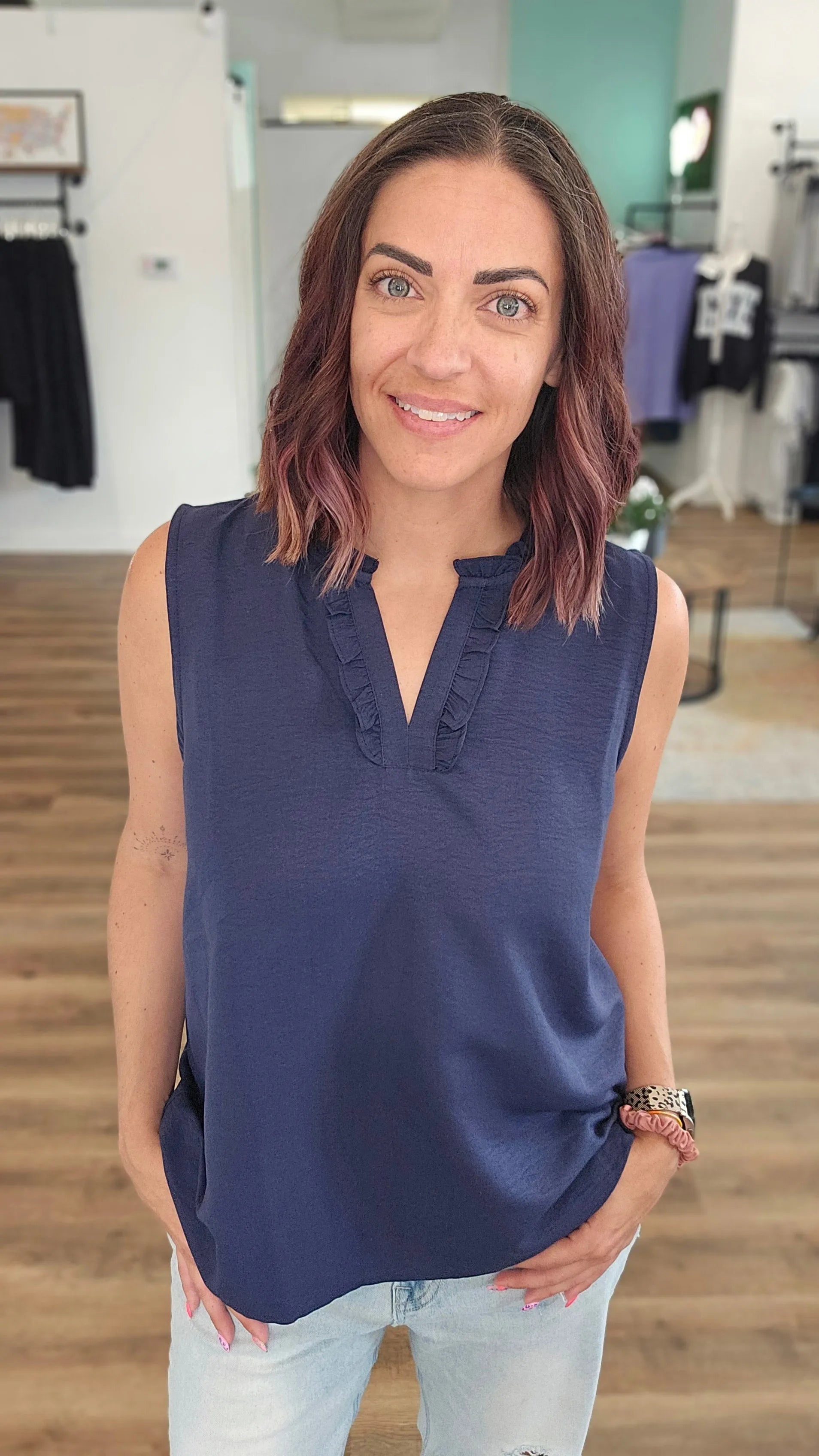 Shop Navy Ruffle Neck Sleeveless Blouse- at Ruby Joy Boutique, a Women's Clothing Store in Pickerington, Ohio