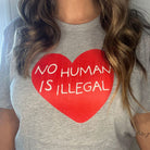 Shop No Human Is Illegal Classic Tee | Kind Cotton- at Ruby Joy Boutique, a Women's Clothing Store in Pickerington, Ohio