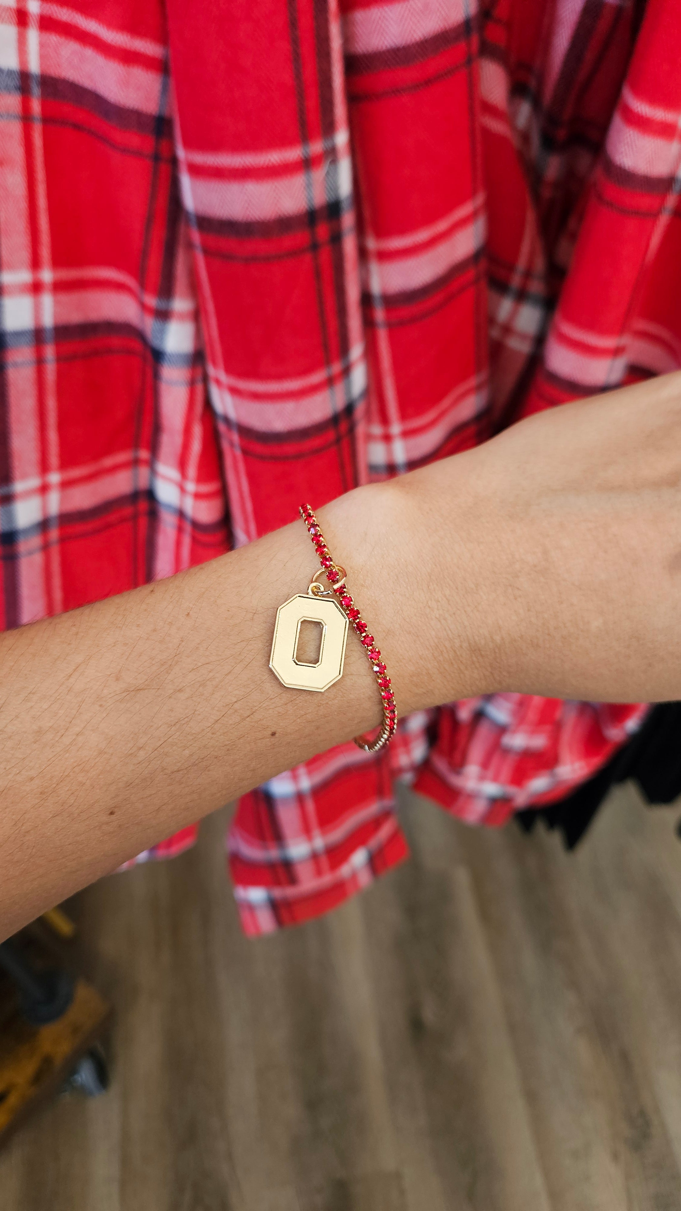 Shop Ohio State Buckeyes Shiny Gold Logo Charm- at Ruby Joy Boutique, a Women's Clothing Store in Pickerington, Ohio