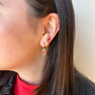 Shop Ohio State University Logo Charm Huggie Earrings- at Ruby Joy Boutique, a Women's Clothing Store in Pickerington, Ohio