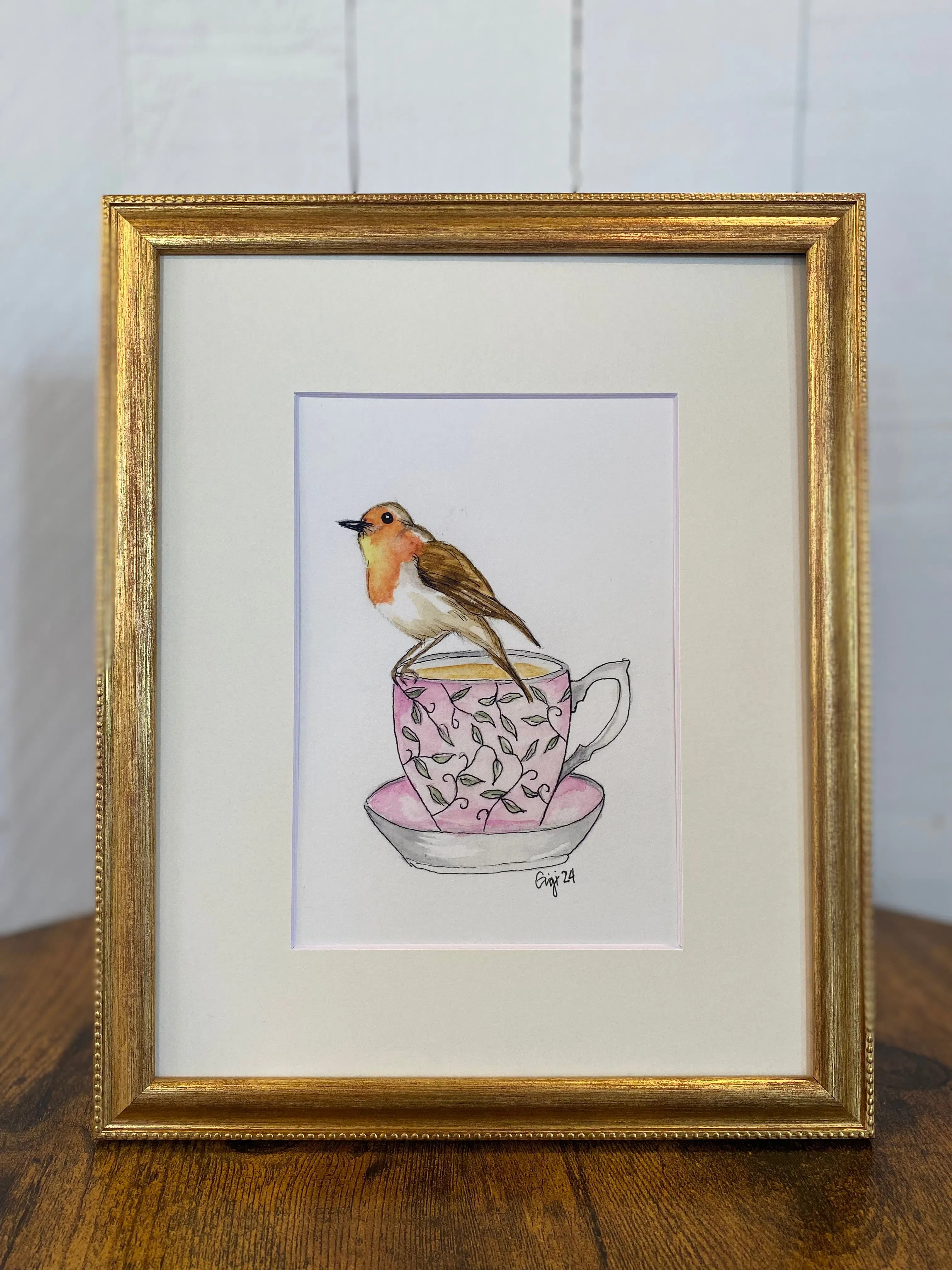 Shop Original Watercolor Prints-Robin on a Teacup at Ruby Joy Boutique, a Women's Clothing Store in Pickerington, Ohio