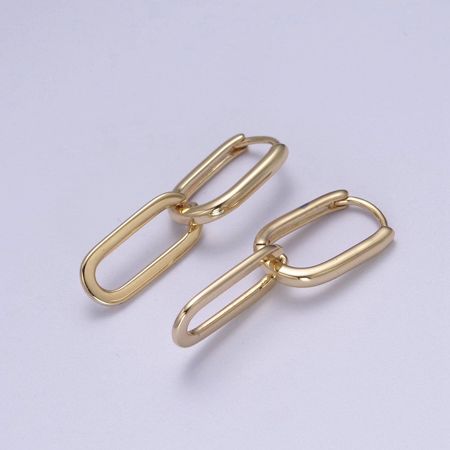 Shop Oval Link Huggie Earrings- at Ruby Joy Boutique, a Women's Clothing Store in Pickerington, Ohio
