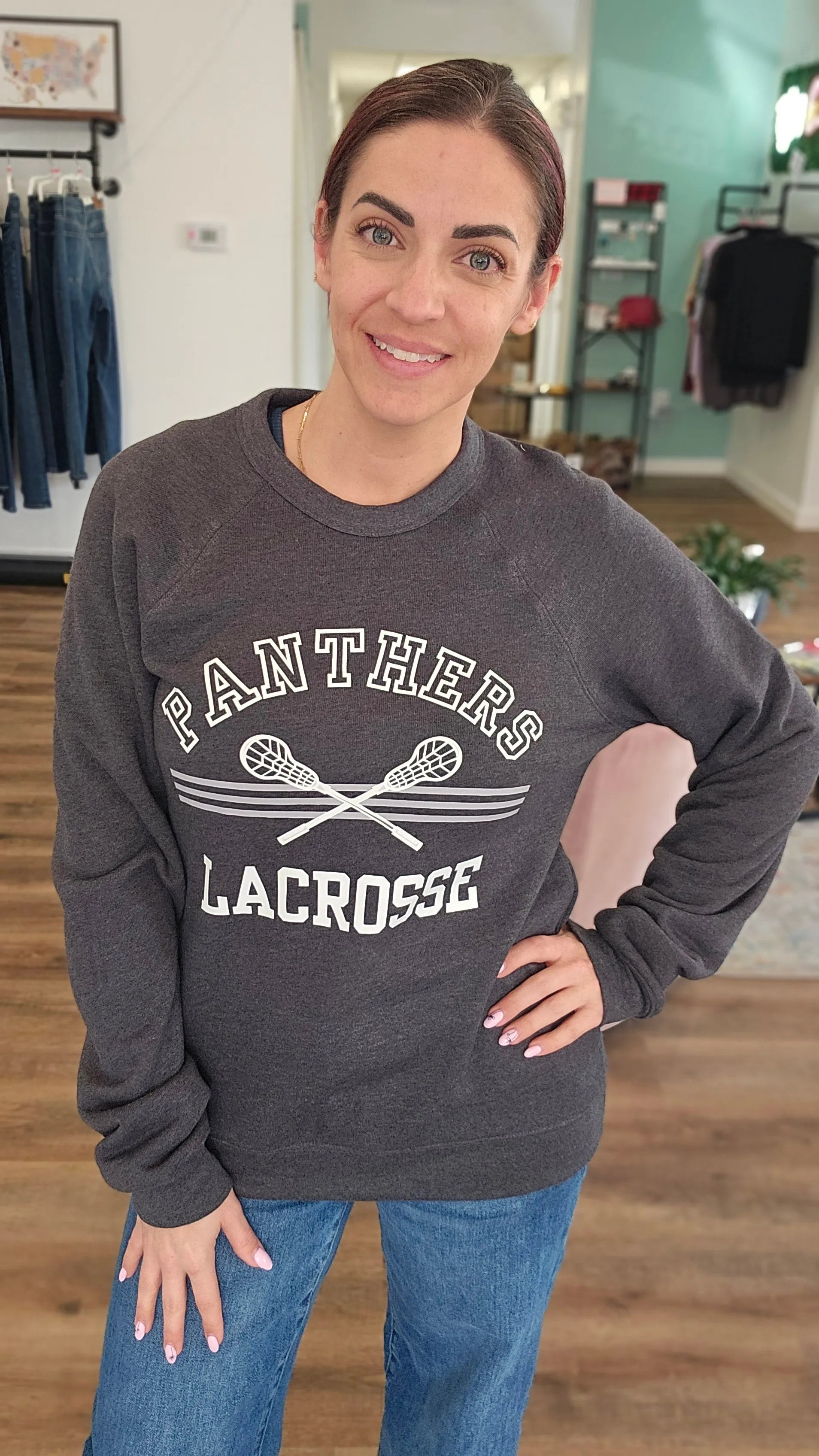 Shop Panthers Lacrosse Arch Graphic Top- at Ruby Joy Boutique, a Women's Clothing Store in Pickerington, Ohio