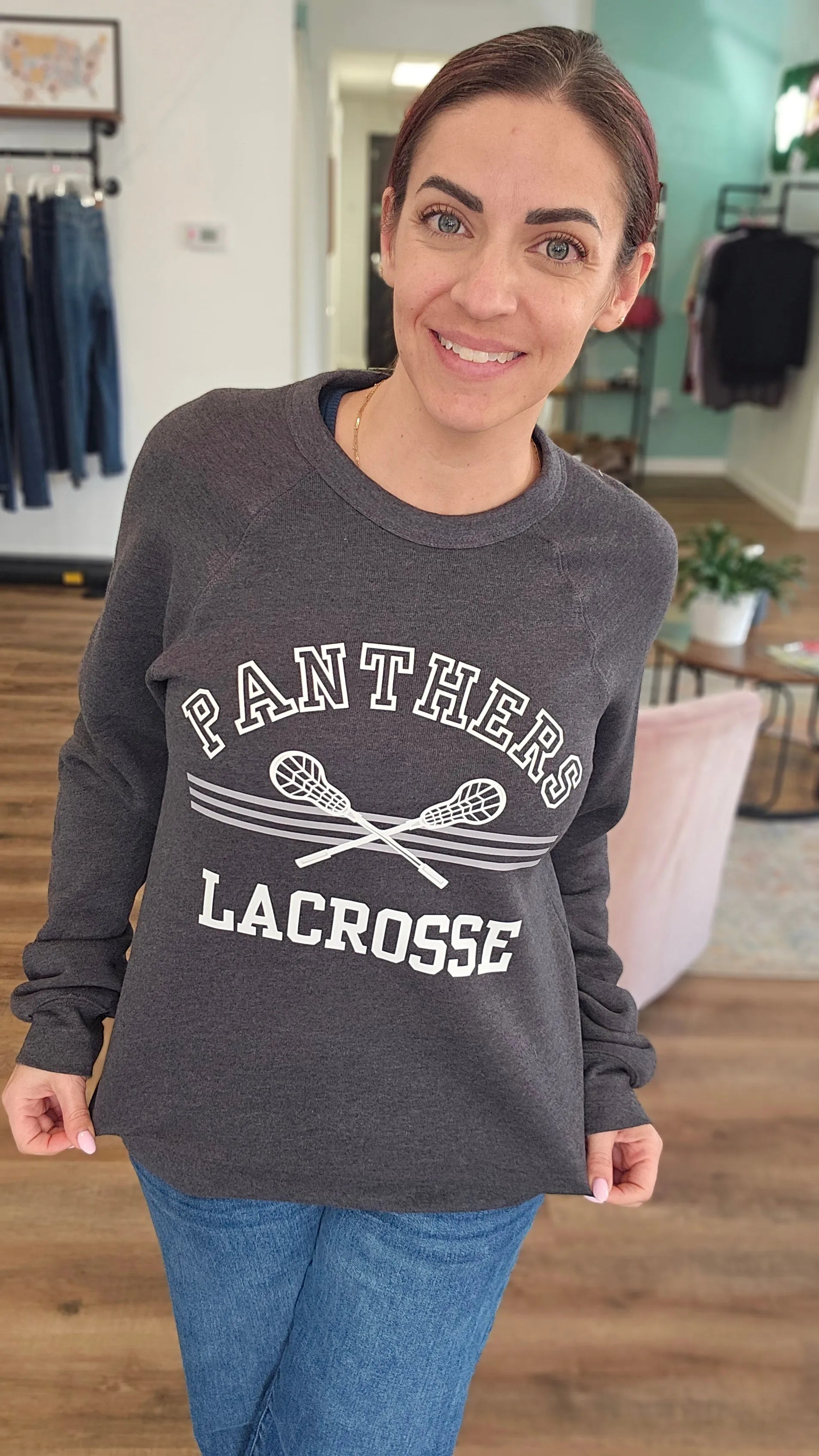 Shop Panthers Lacrosse Arch Graphic Top- at Ruby Joy Boutique, a Women's Clothing Store in Pickerington, Ohio