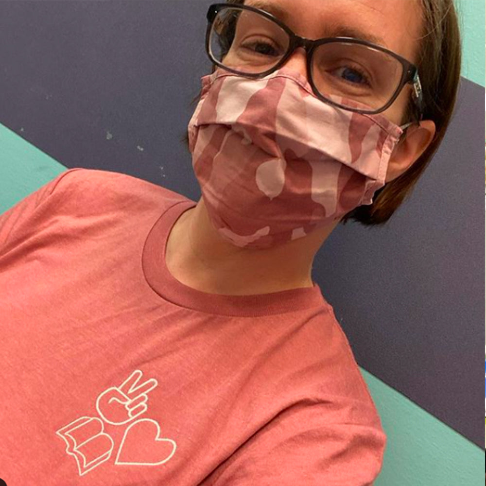 Shop Peace, Love, Books Classic Tee | Kind Cotton- at Ruby Joy Boutique, a Women's Clothing Store in Pickerington, Ohio