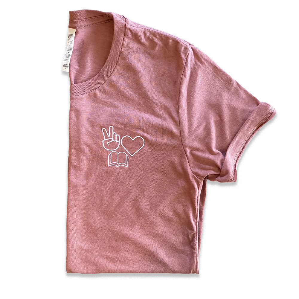 Shop Peace, Love, Books Classic Tee | Kind Cotton- at Ruby Joy Boutique, a Women's Clothing Store in Pickerington, Ohio