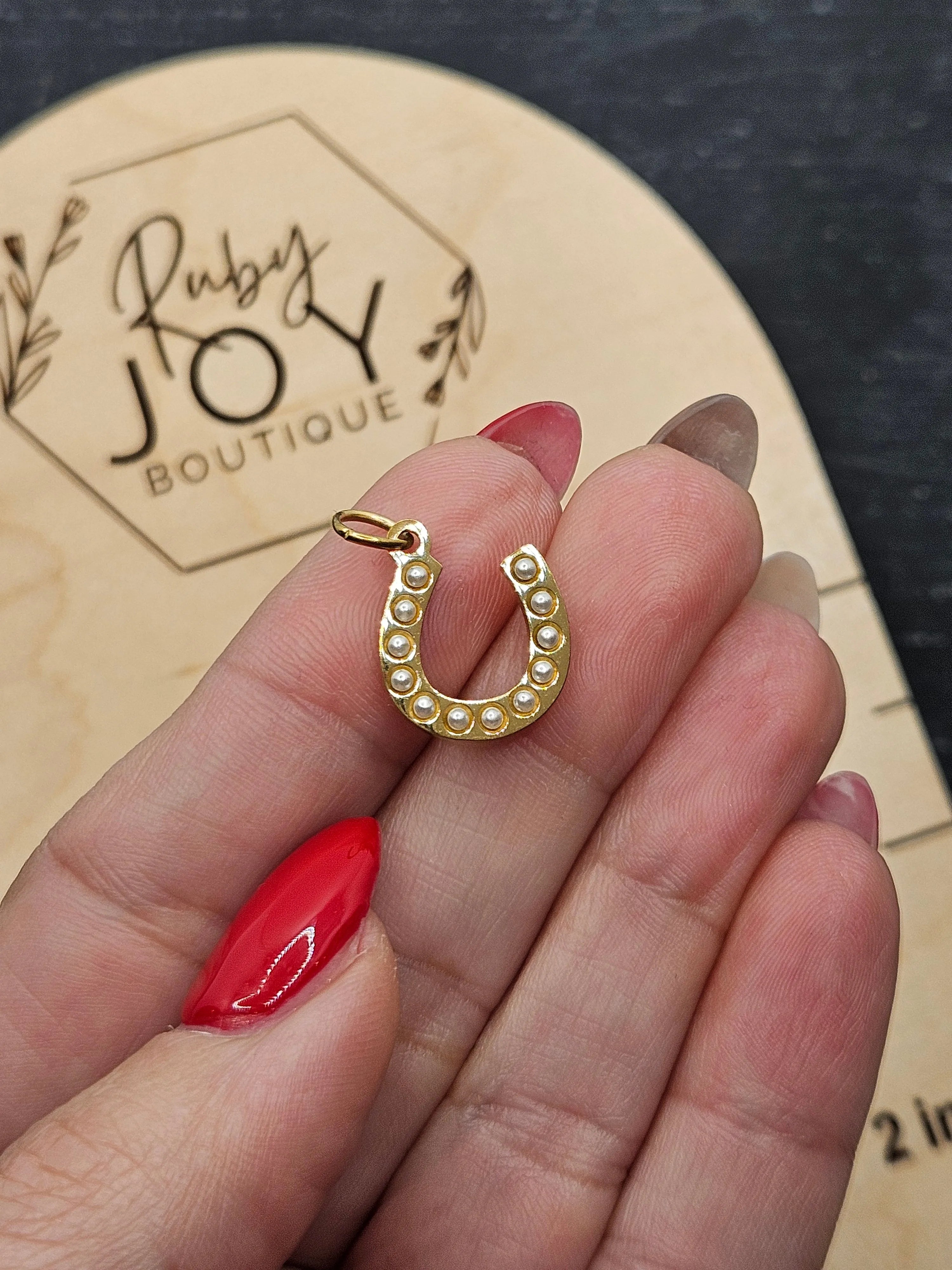 Shop Pearl Horseshoe Charm- at Ruby Joy Boutique, a Women's Clothing Store in Pickerington, Ohio