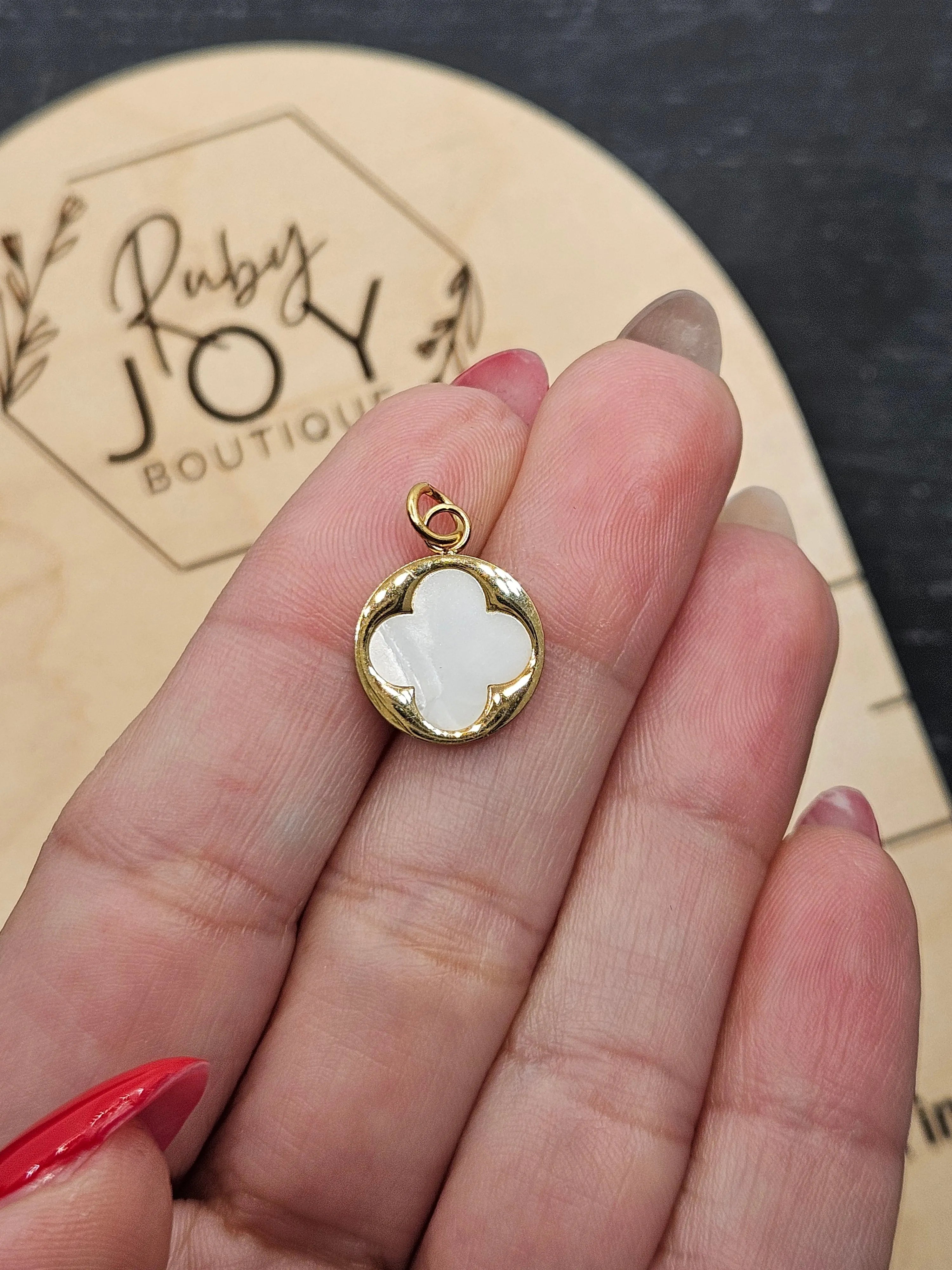 Shop Pearl Quatrefoil Charm- at Ruby Joy Boutique, a Women's Clothing Store in Pickerington, Ohio
