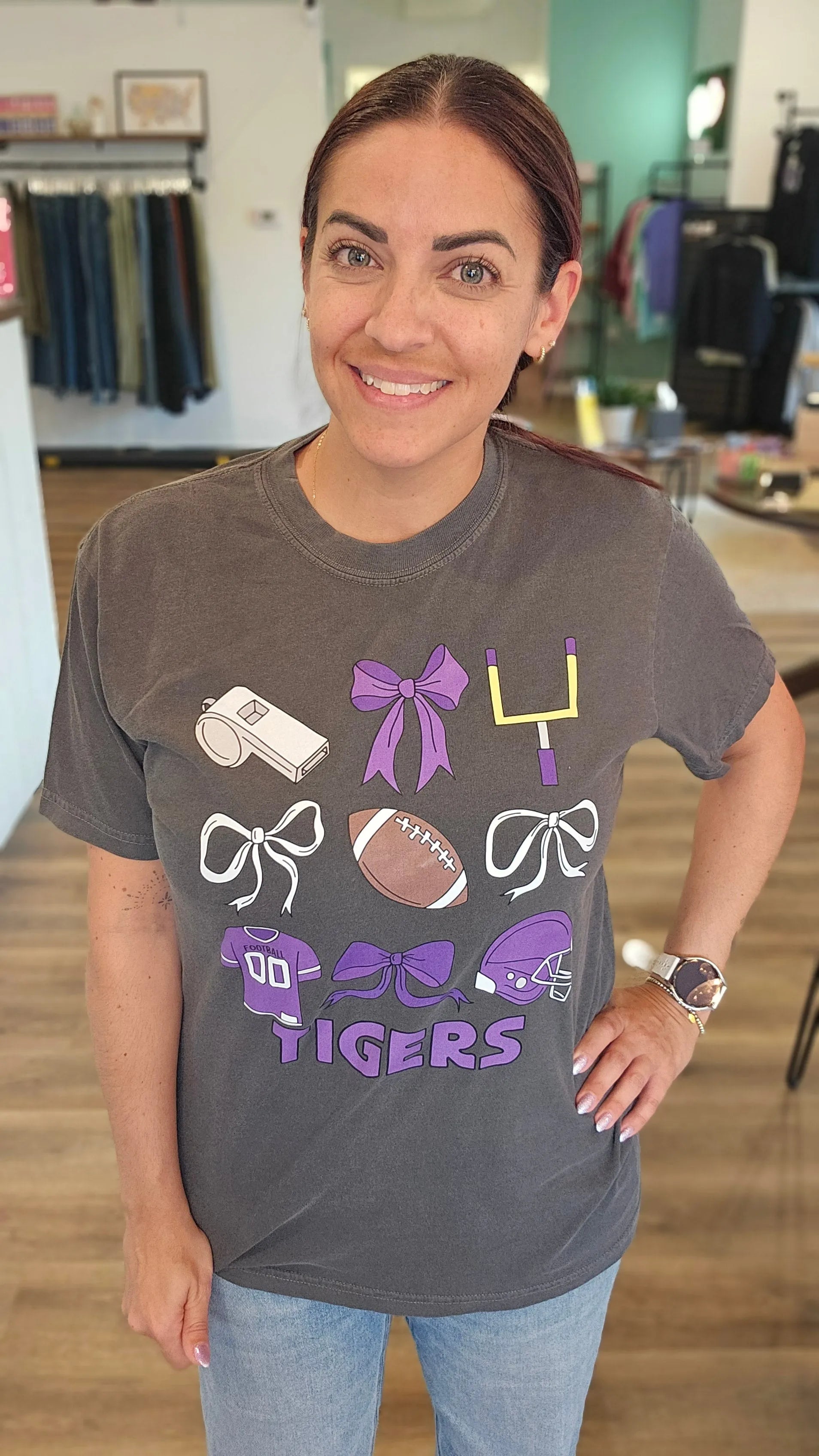 Shop Pickerington Football Bow Collage Stack Graphic Tee-Tigers at Ruby Joy Boutique, a Women's Clothing Store in Pickerington, Ohio