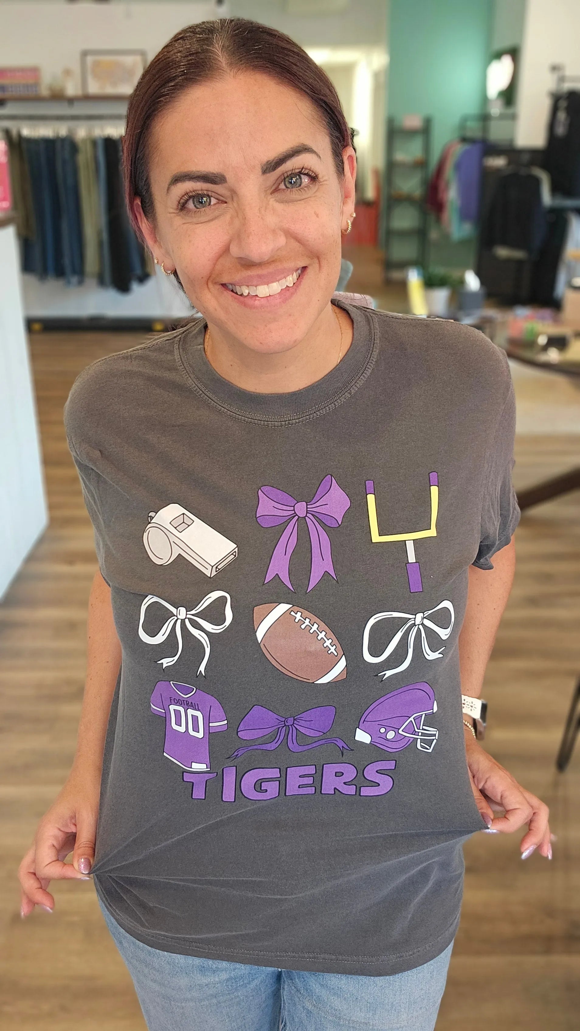 Shop Pickerington Football Bow Collage Stack Graphic Tee- at Ruby Joy Boutique, a Women's Clothing Store in Pickerington, Ohio
