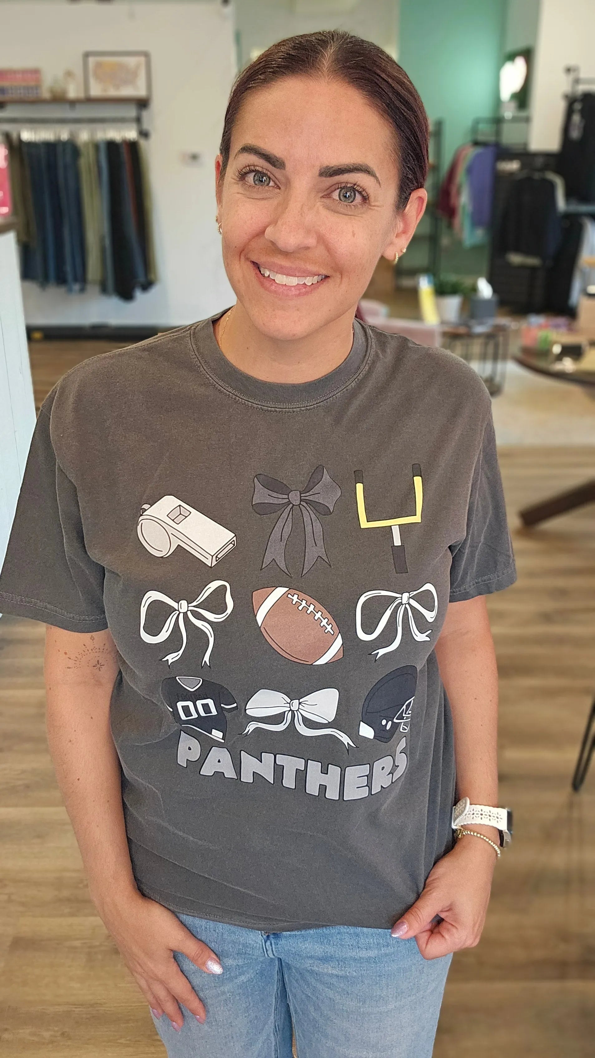 Shop Pickerington Football Bow Collage Stack Graphic Tee- at Ruby Joy Boutique, a Women's Clothing Store in Pickerington, Ohio