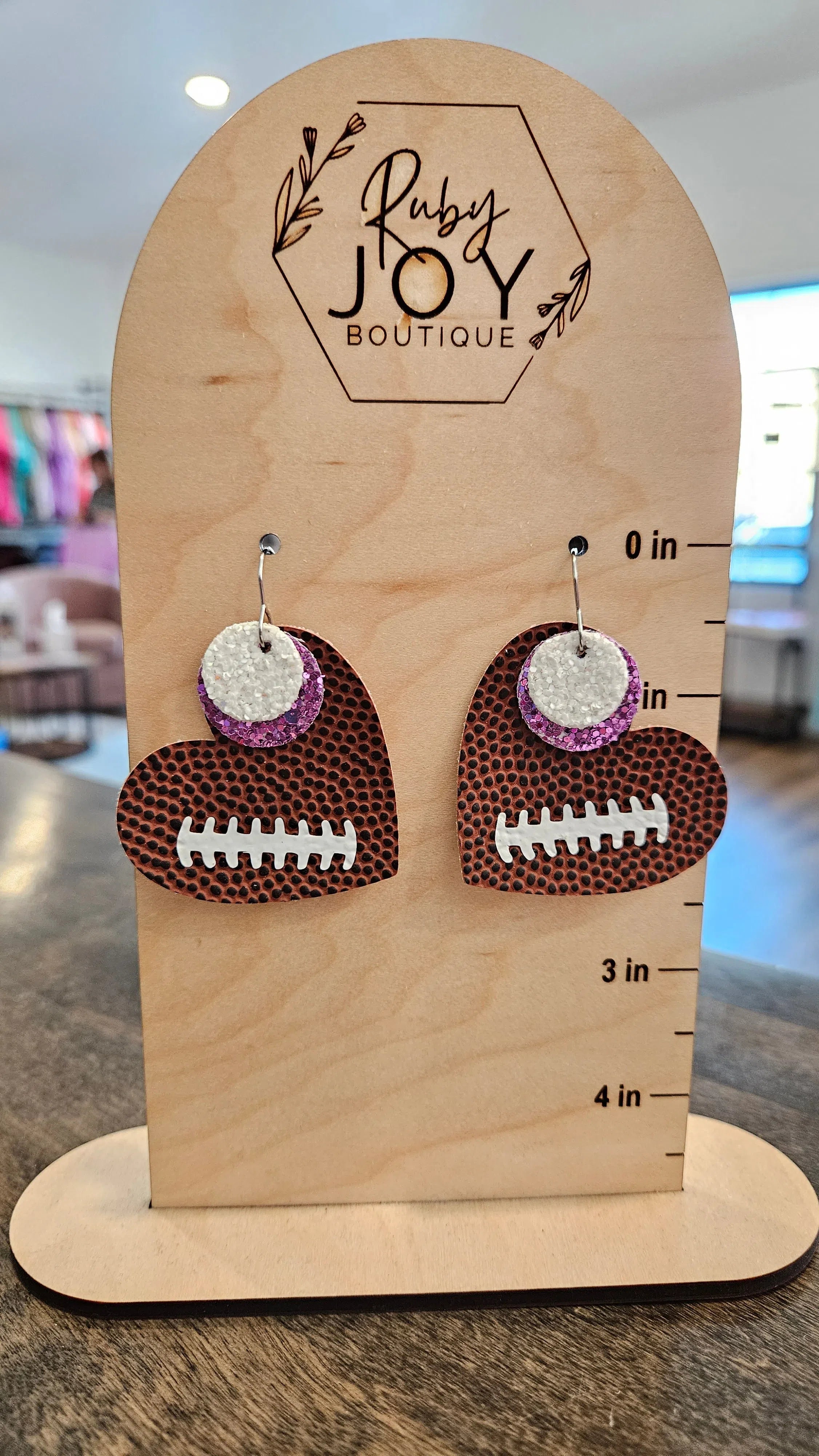 Shop Pickerington Sparkle Heart Football Earrings-Earrings at Ruby Joy Boutique, a Women's Clothing Store in Pickerington, Ohio