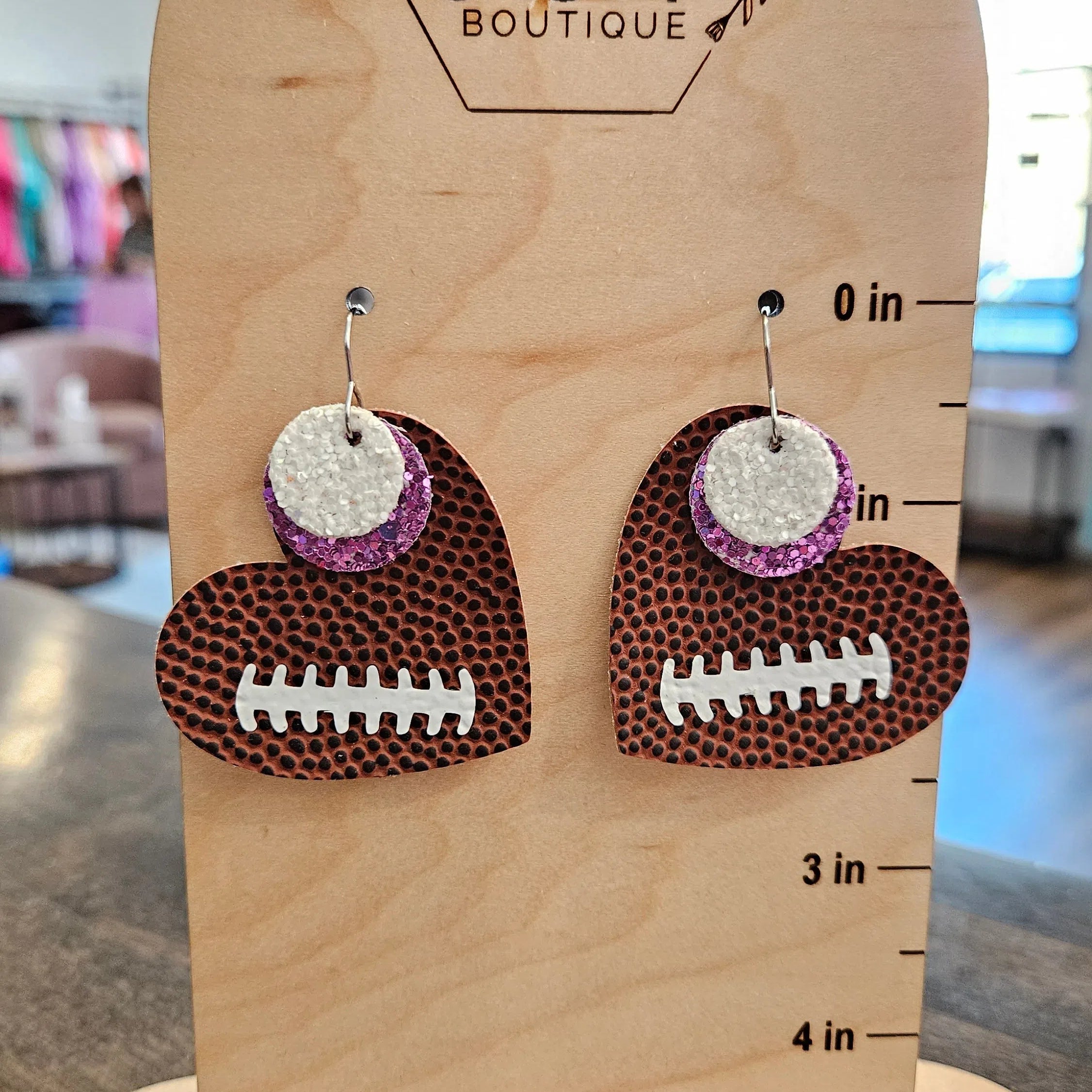 Shop Pickerington Sparkle Heart Football Earrings-Earrings at Ruby Joy Boutique, a Women's Clothing Store in Pickerington, Ohio