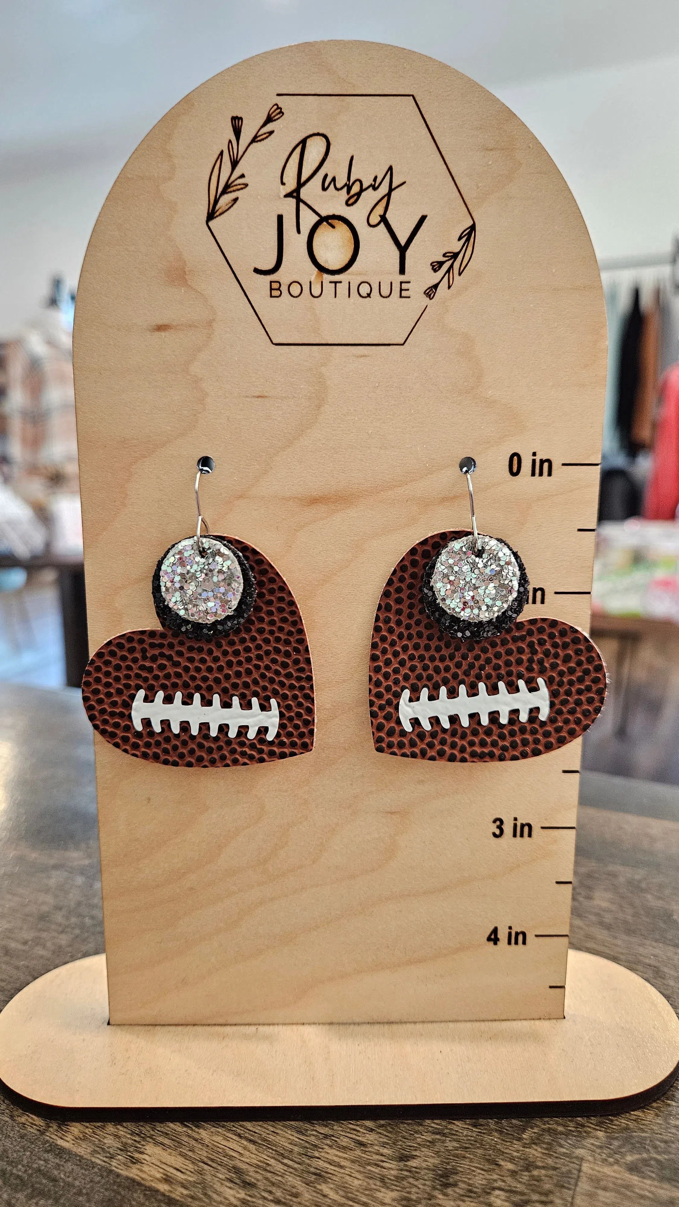 Shop Pickerington Sparkle Heart Football Earrings-Earrings at Ruby Joy Boutique, a Women's Clothing Store in Pickerington, Ohio