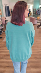 Shop Pigment Dyed Pullover with Side Slits - Green- at Ruby Joy Boutique, a Women's Clothing Store in Pickerington, Ohio