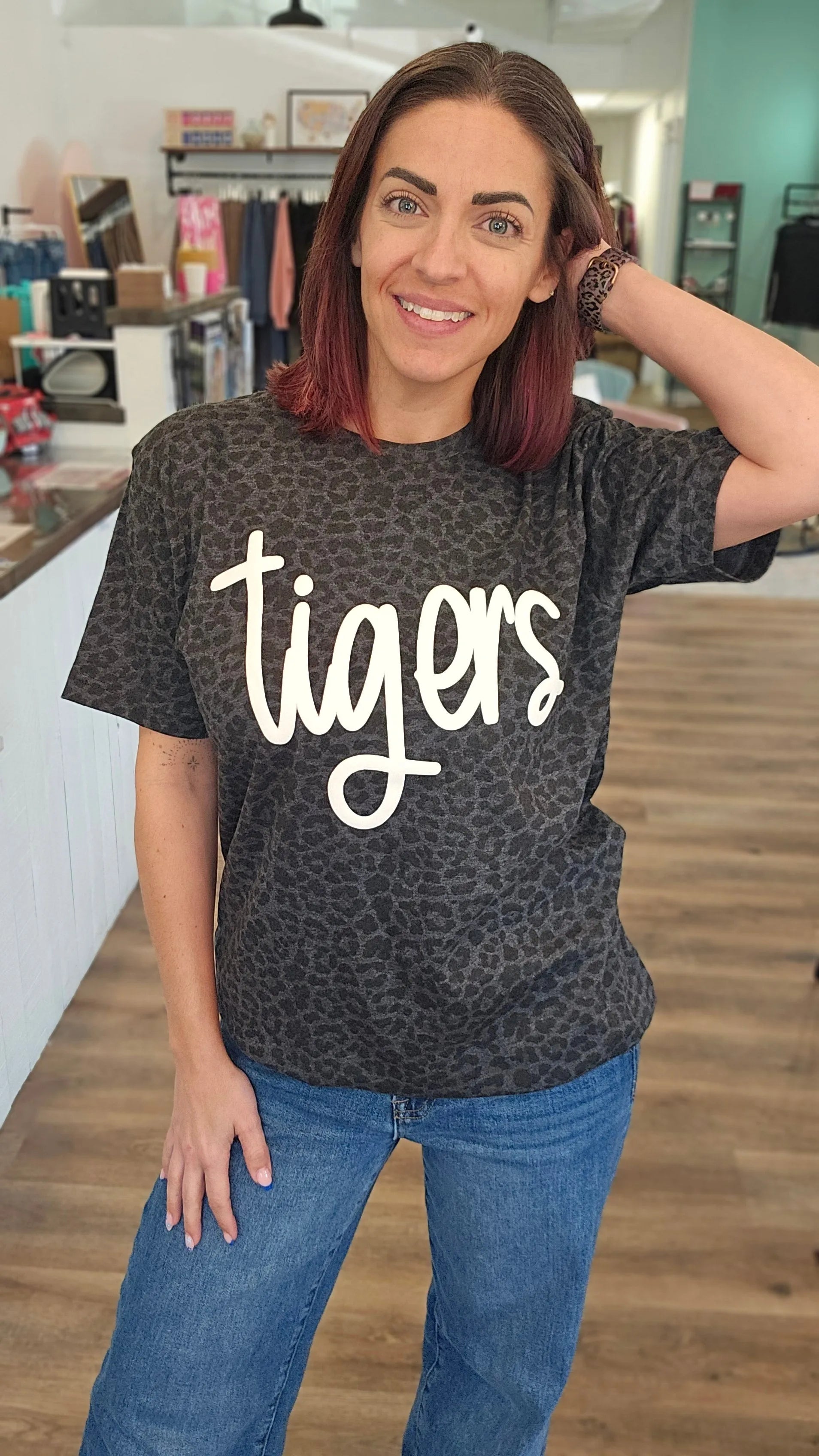 Shop Puff Print Script Mascot Leopard Print Tee- at Ruby Joy Boutique, a Women's Clothing Store in Pickerington, Ohio