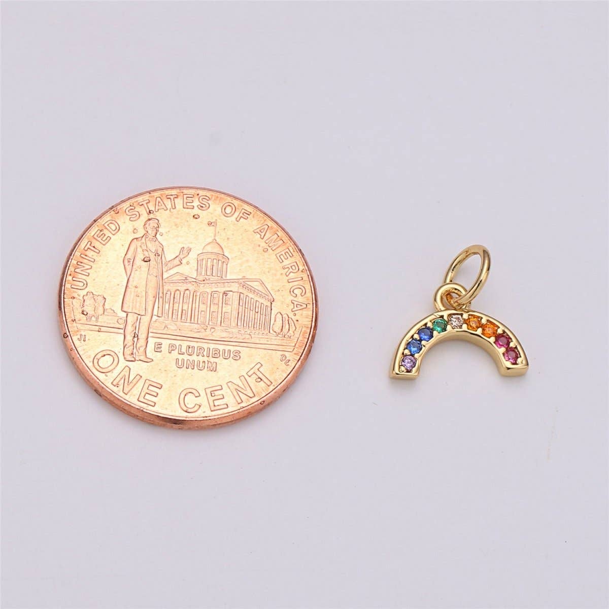 Shop Rainbow Charm 18k Gold Filled- at Ruby Joy Boutique, a Women's Clothing Store in Pickerington, Ohio