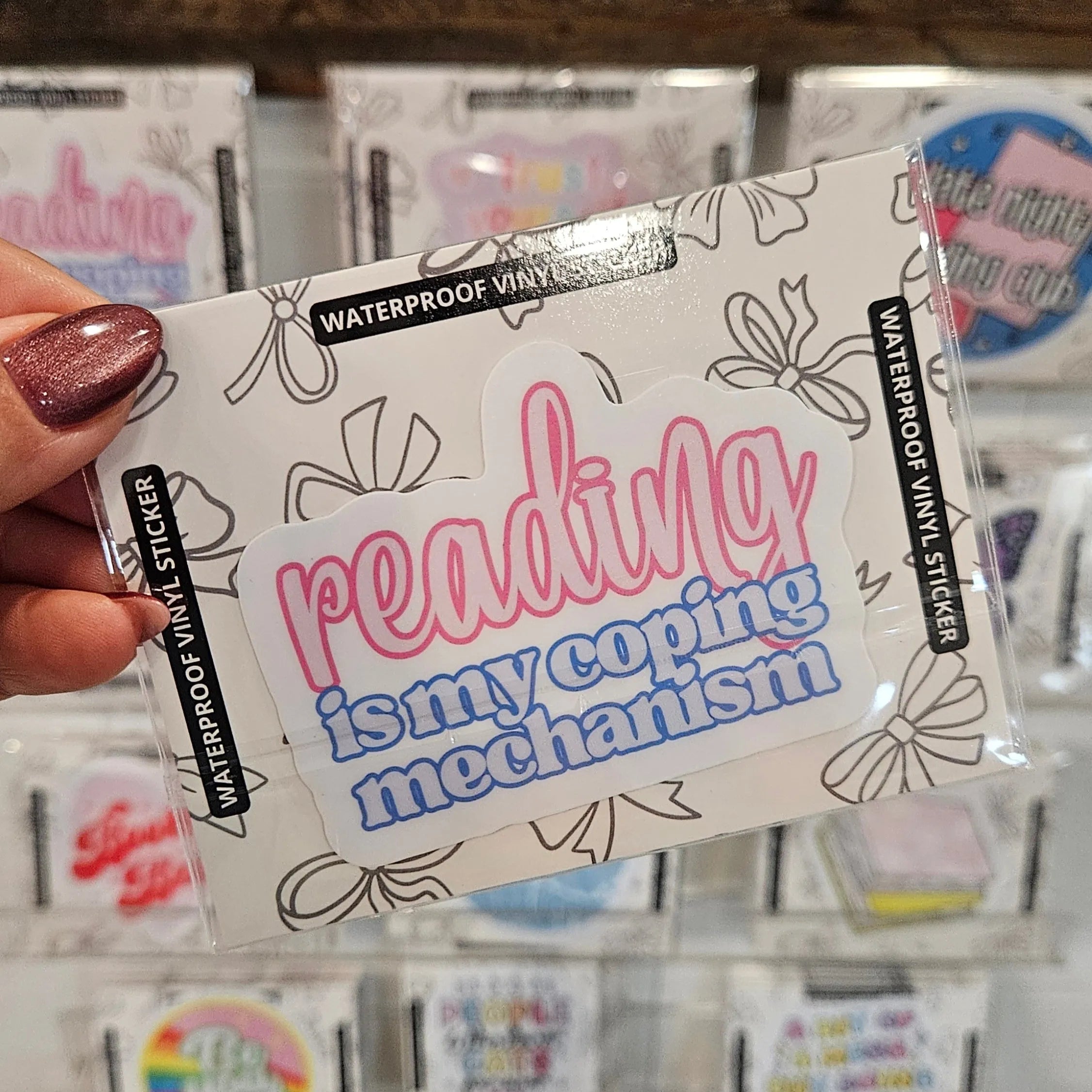 Shop Reading is My Coping Mechanism | Waterproof Vinyl Sticker- at Ruby Joy Boutique, a Women's Clothing Store in Pickerington, Ohio