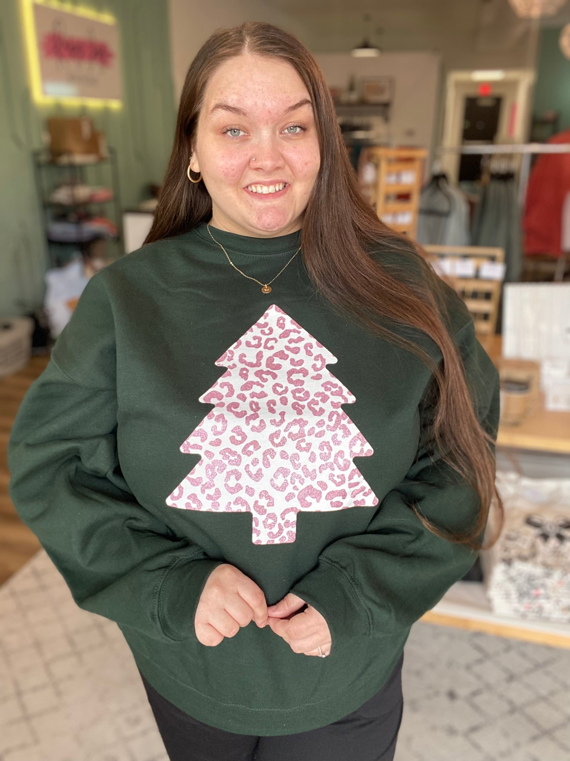 Shop Rose Gold Glitter Leopard Print Christmas Tree Sweatshirt-Sweatshirt at Ruby Joy Boutique, a Women's Clothing Store in Pickerington, Ohio