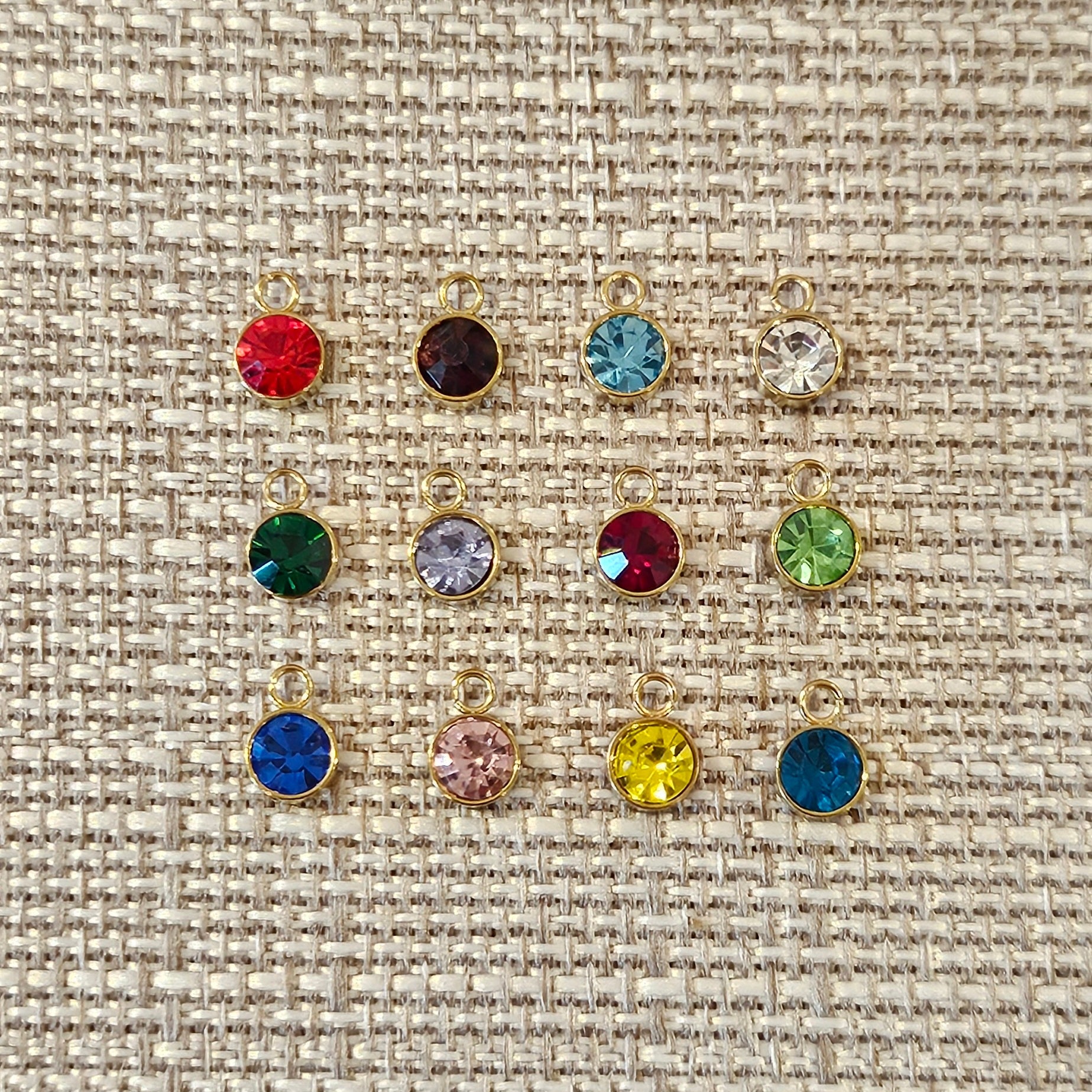 Shop Round Birthstone Charms-Charms at Ruby Joy Boutique, a Women's Clothing Store in Pickerington, Ohio