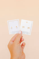 Shop Sadie Bow Screwback Stud Earrings- at Ruby Joy Boutique, a Women's Clothing Store in Pickerington, Ohio
