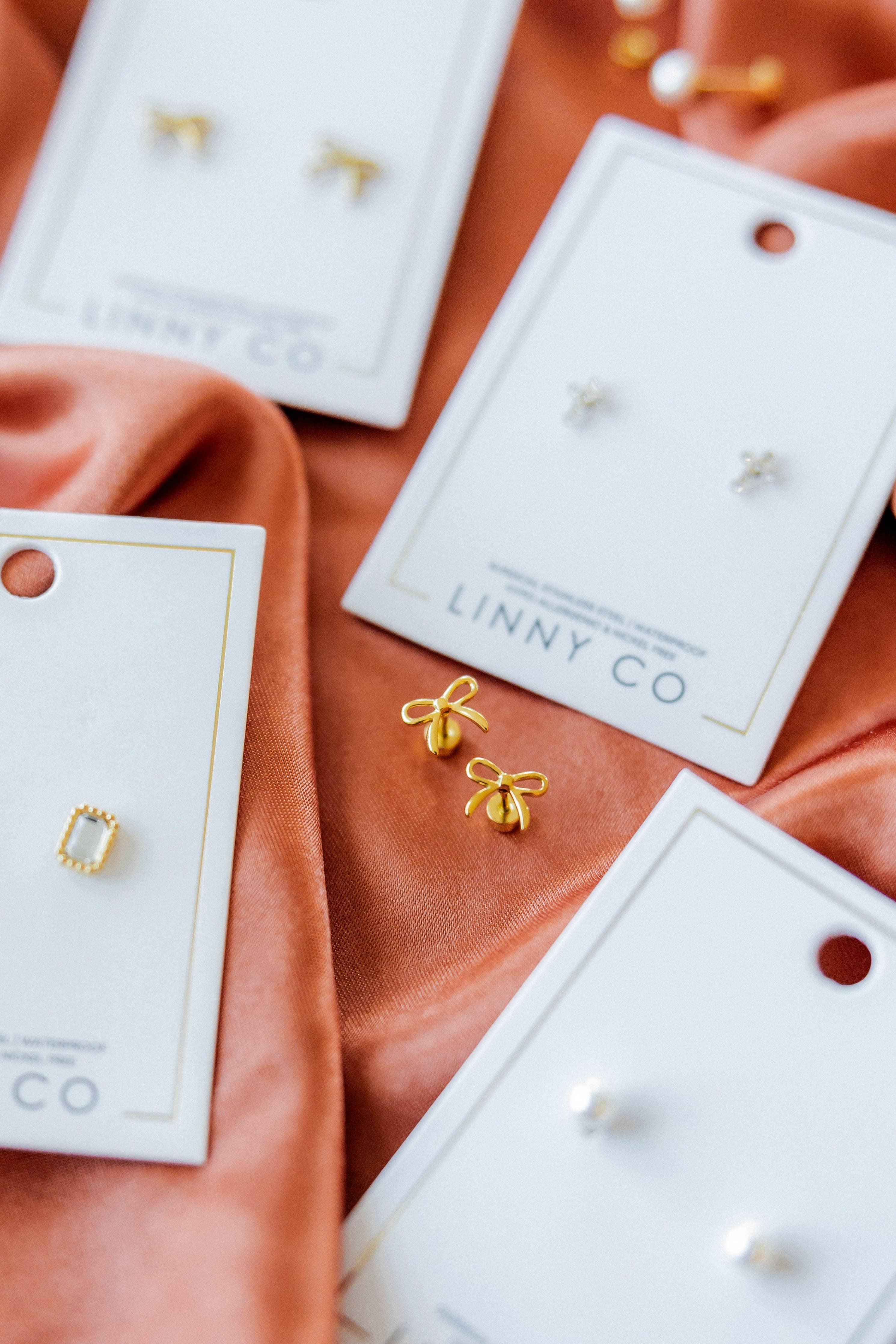 Shop Sadie Bow Screwback Stud Earrings- at Ruby Joy Boutique, a Women's Clothing Store in Pickerington, Ohio