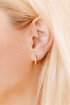 Shop Scarlett Huggie Hoop Earrings - 12mm- at Ruby Joy Boutique, a Women's Clothing Store in Pickerington, Ohio