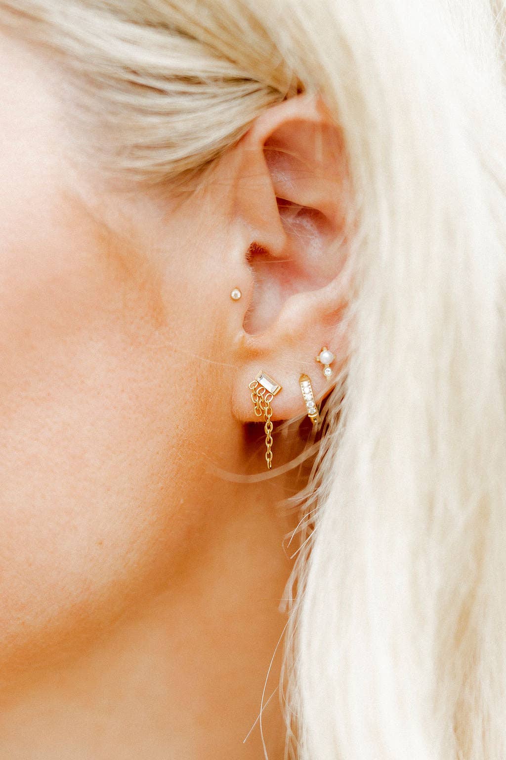 Shop Scarlett Huggie Hoop Earrings - 8mm- at Ruby Joy Boutique, a Women's Clothing Store in Pickerington, Ohio